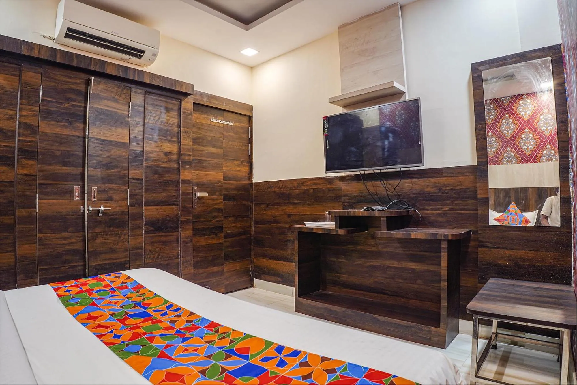 Bed in FabHotel Brij Residency