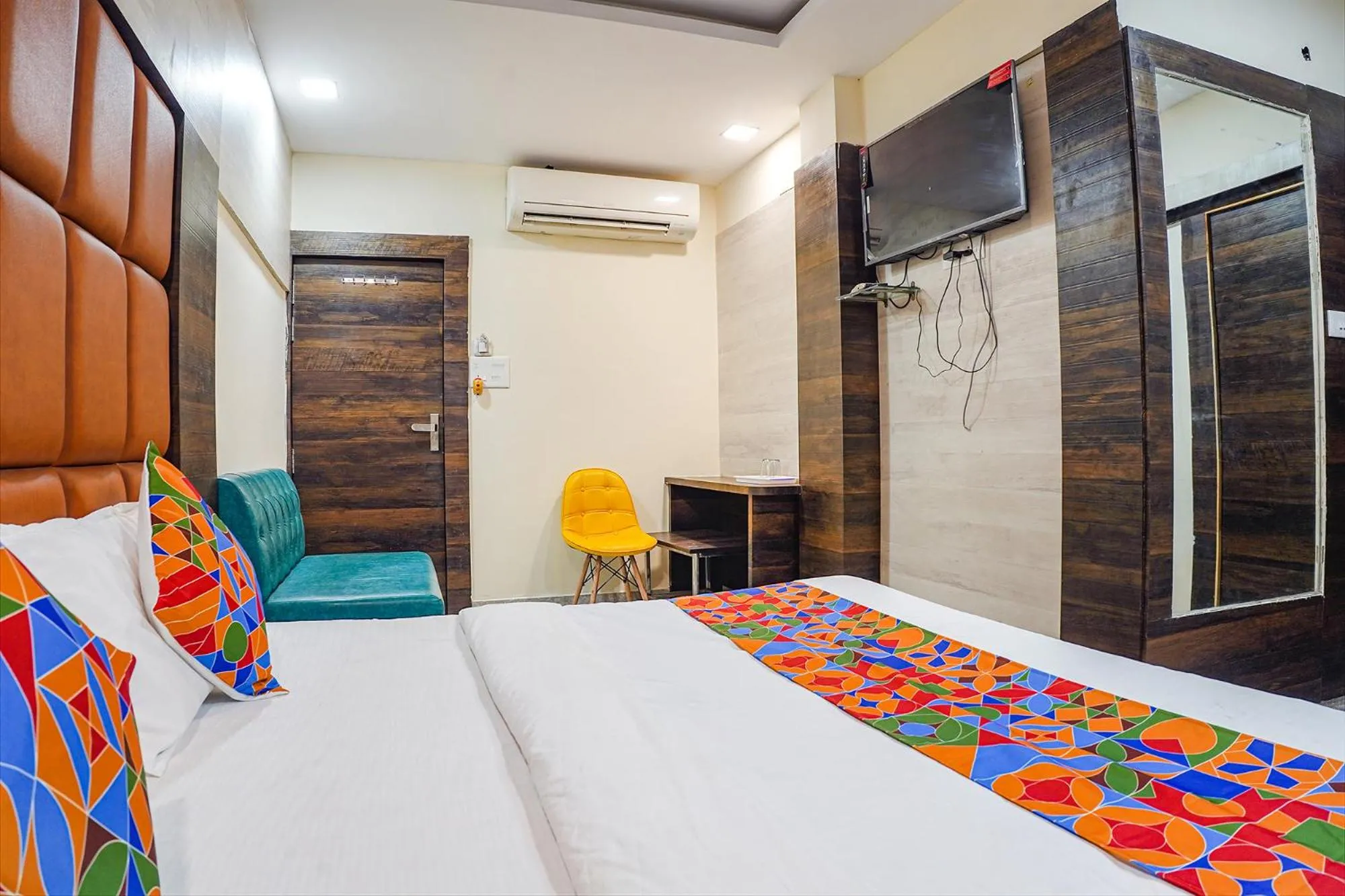 Bed in FabHotel Brij Residency