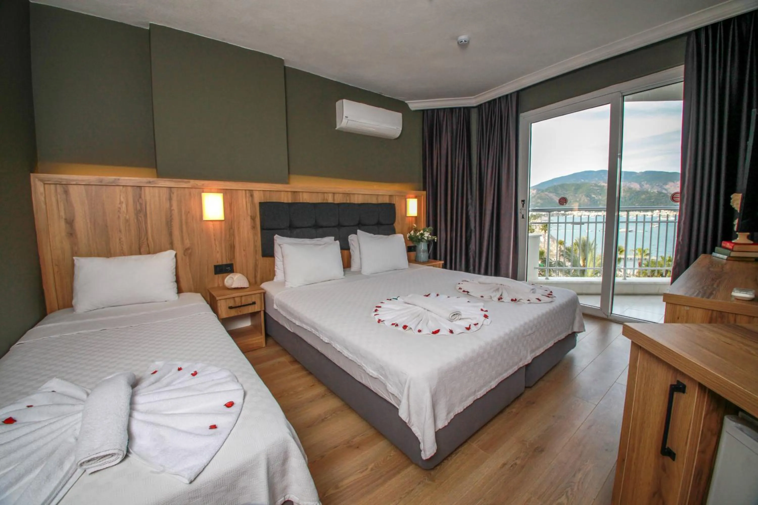 Photo of the whole room, Bed in Yuvam Prime Beach Hotel