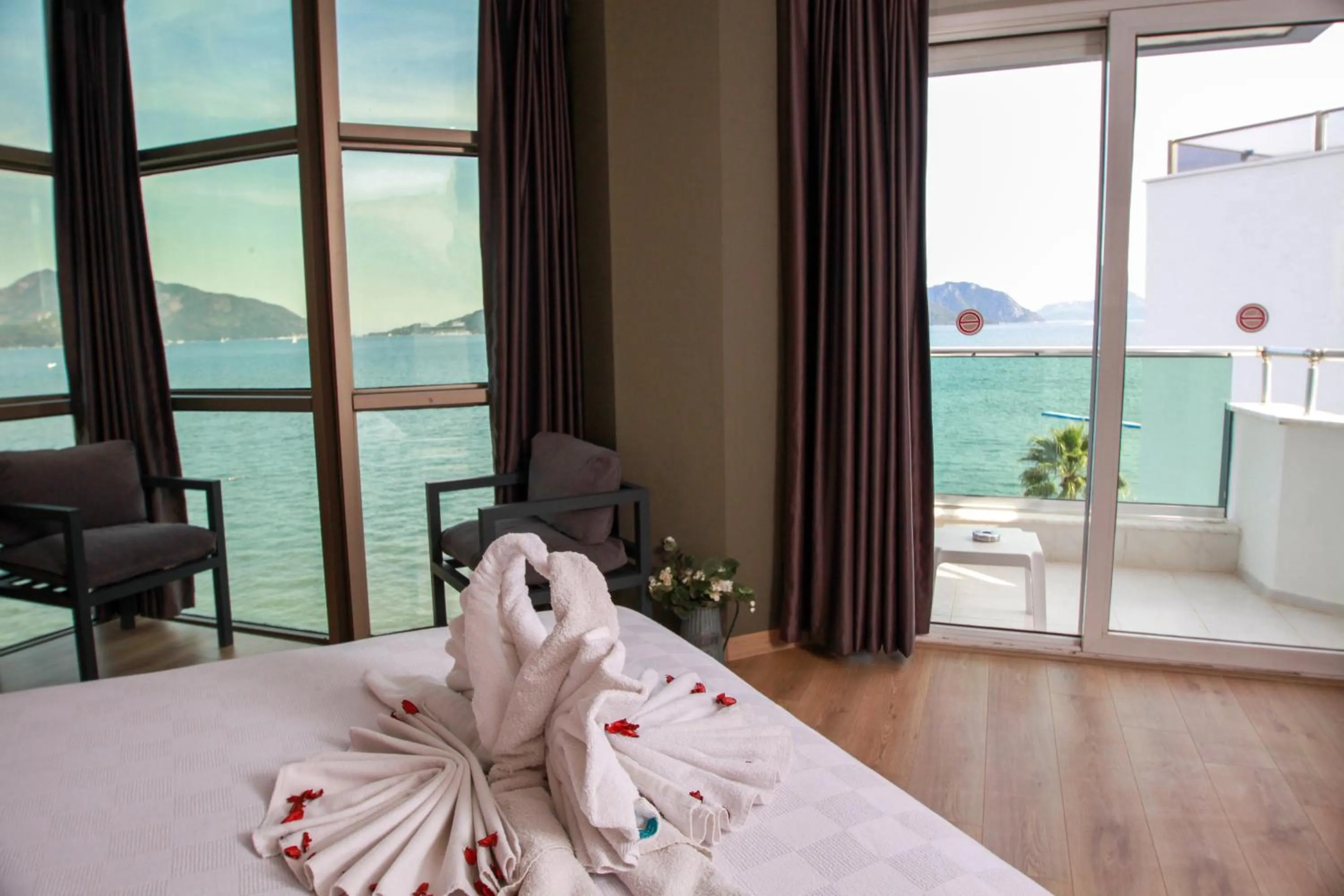 Photo of the whole room, Bed in Yuvam Prime Beach Hotel