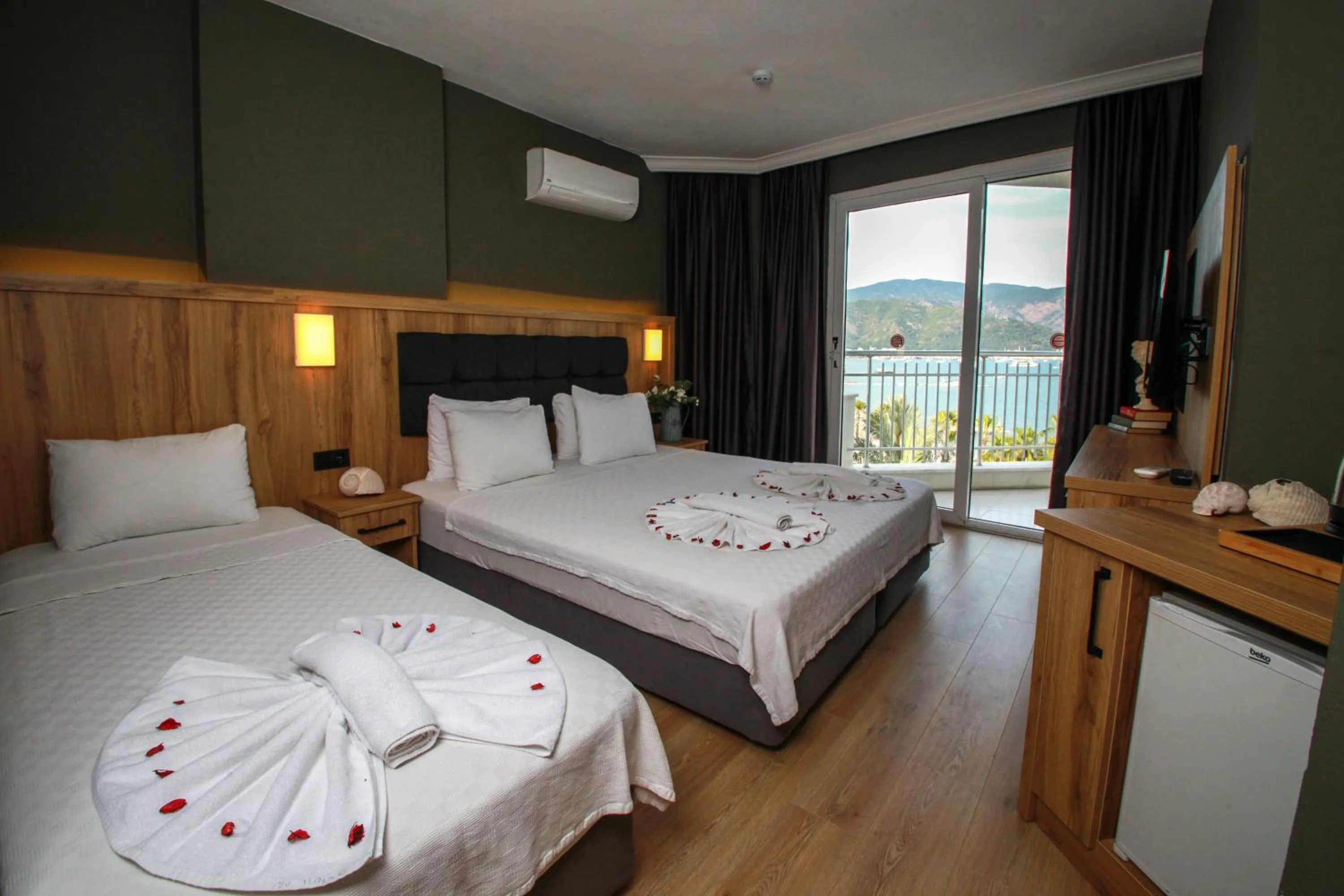 Photo of the whole room, Bed in Yuvam Prime Beach Hotel