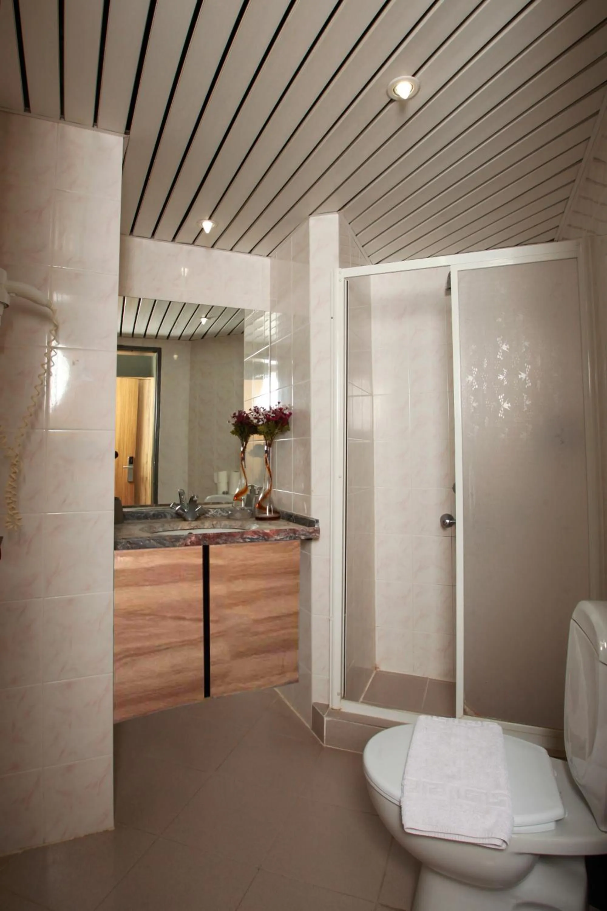 Bathroom in Yuvam Prime Beach Hotel