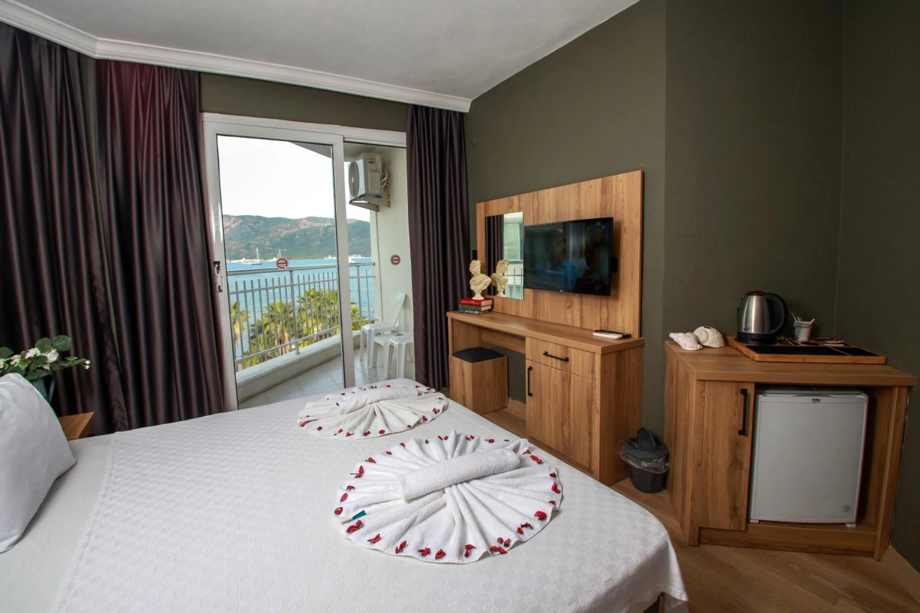 Photo of the whole room, Bed in Yuvam Prime Beach Hotel