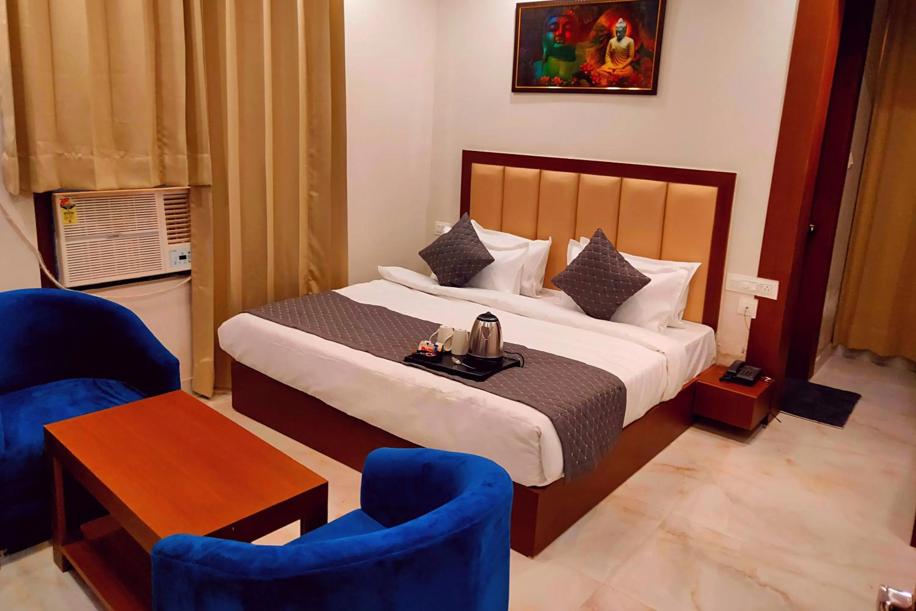 Bedroom in ShriGo Hotel Haridwar