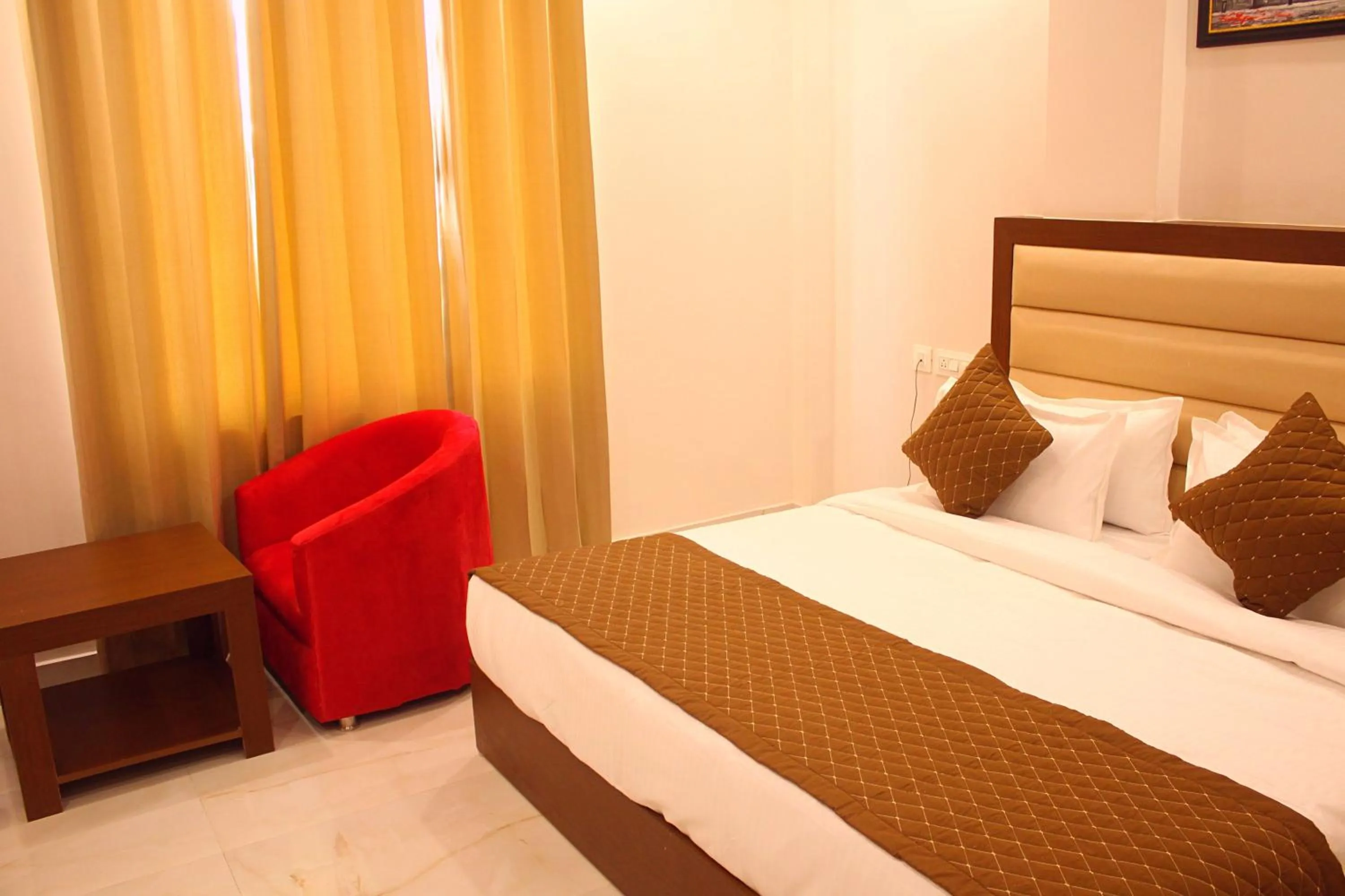 Bedroom in ShriGo Hotel Haridwar