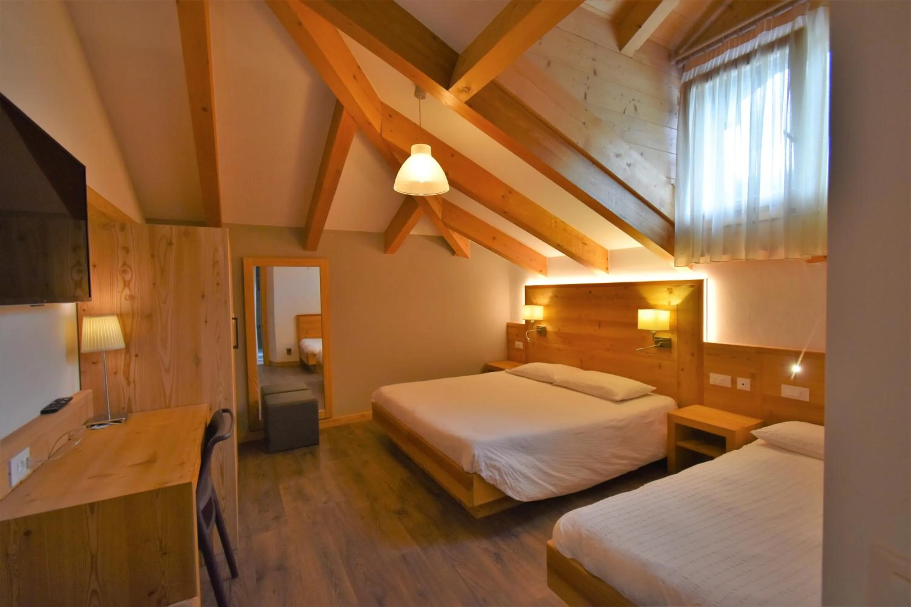 Photo of the whole room, Bed in Hotel Garni Arnica ***S