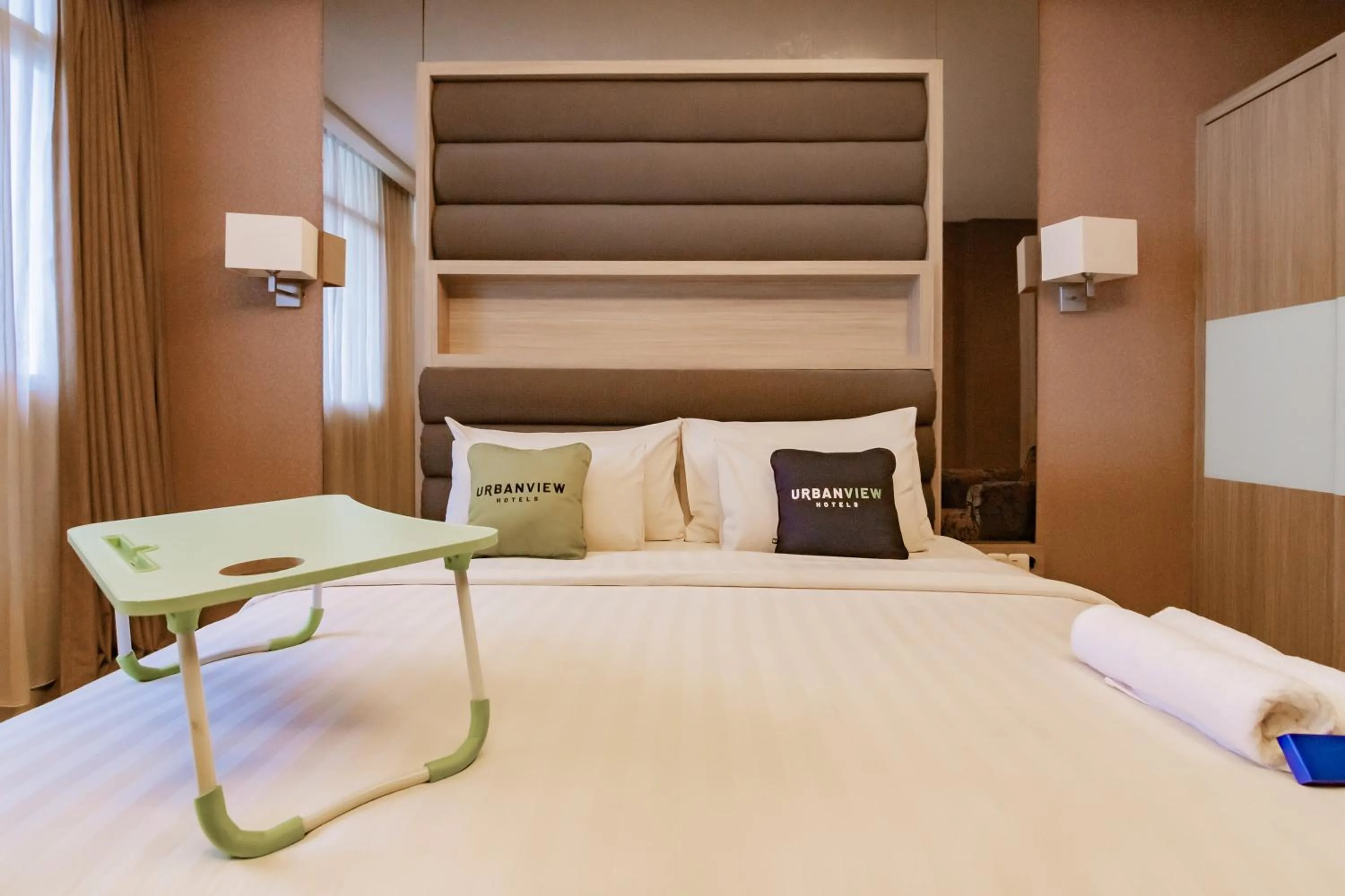 Bedroom, Bed in Urbanview Hotel Newton Riau Bandung by RedDoorz