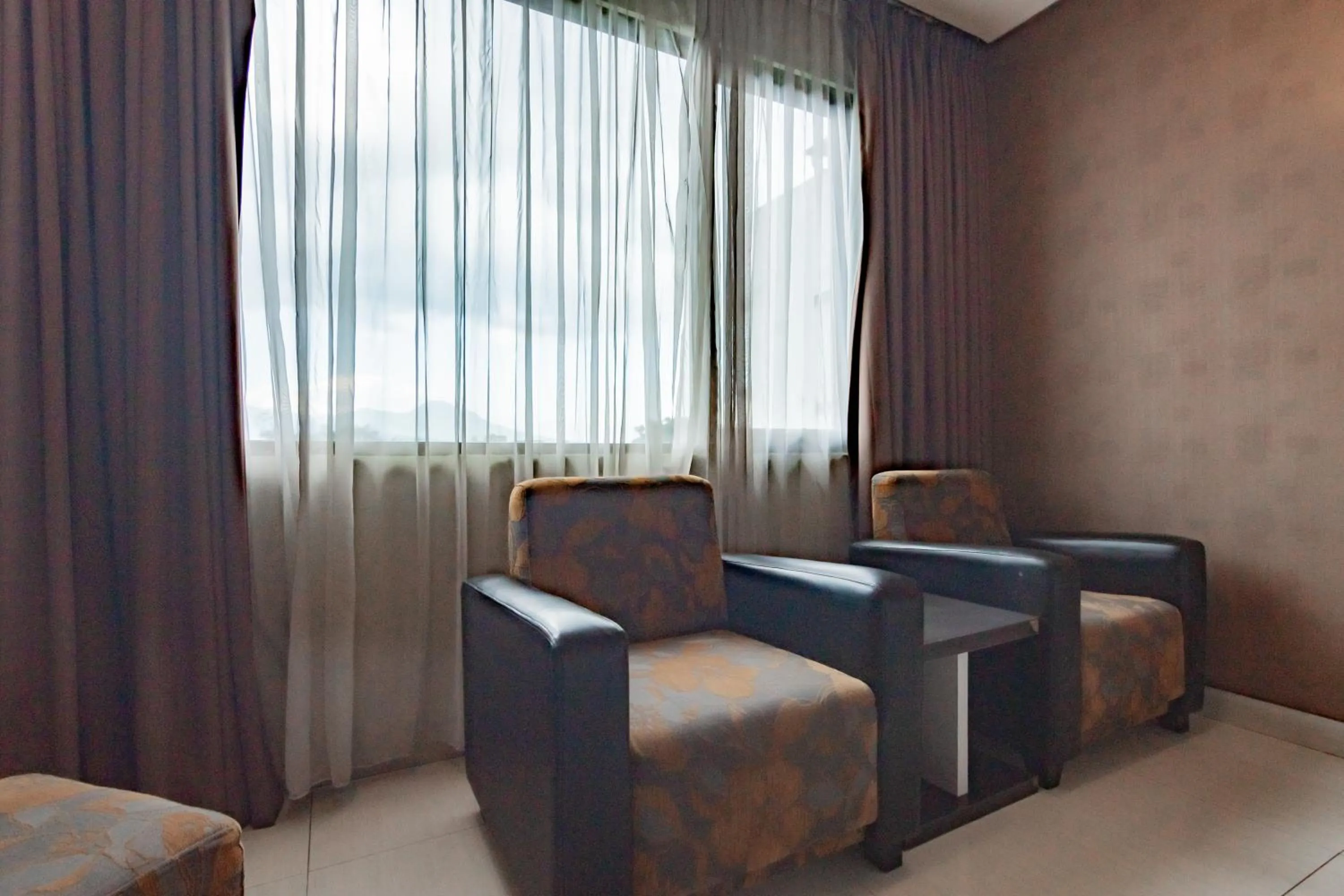Bedroom in Urbanview Hotel Newton Riau Bandung by RedDoorz