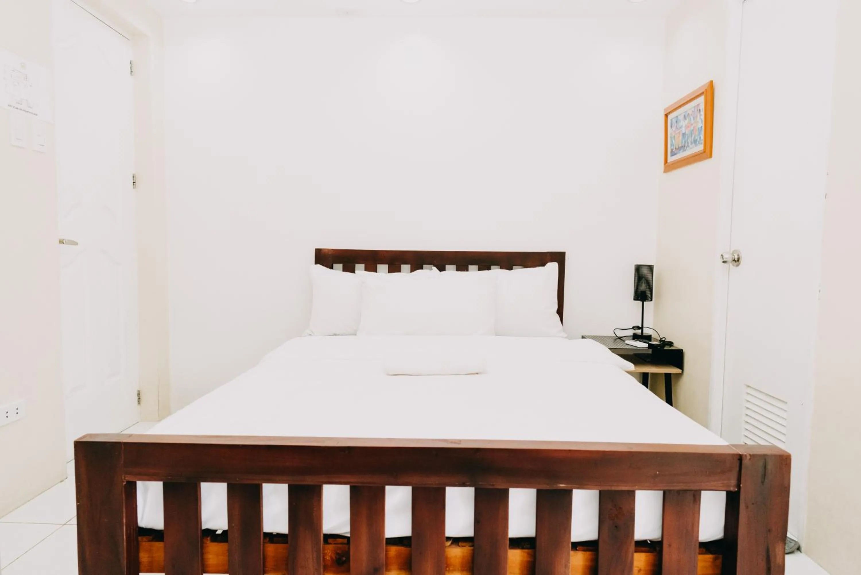 Bed in Nine Balconies Island Stay