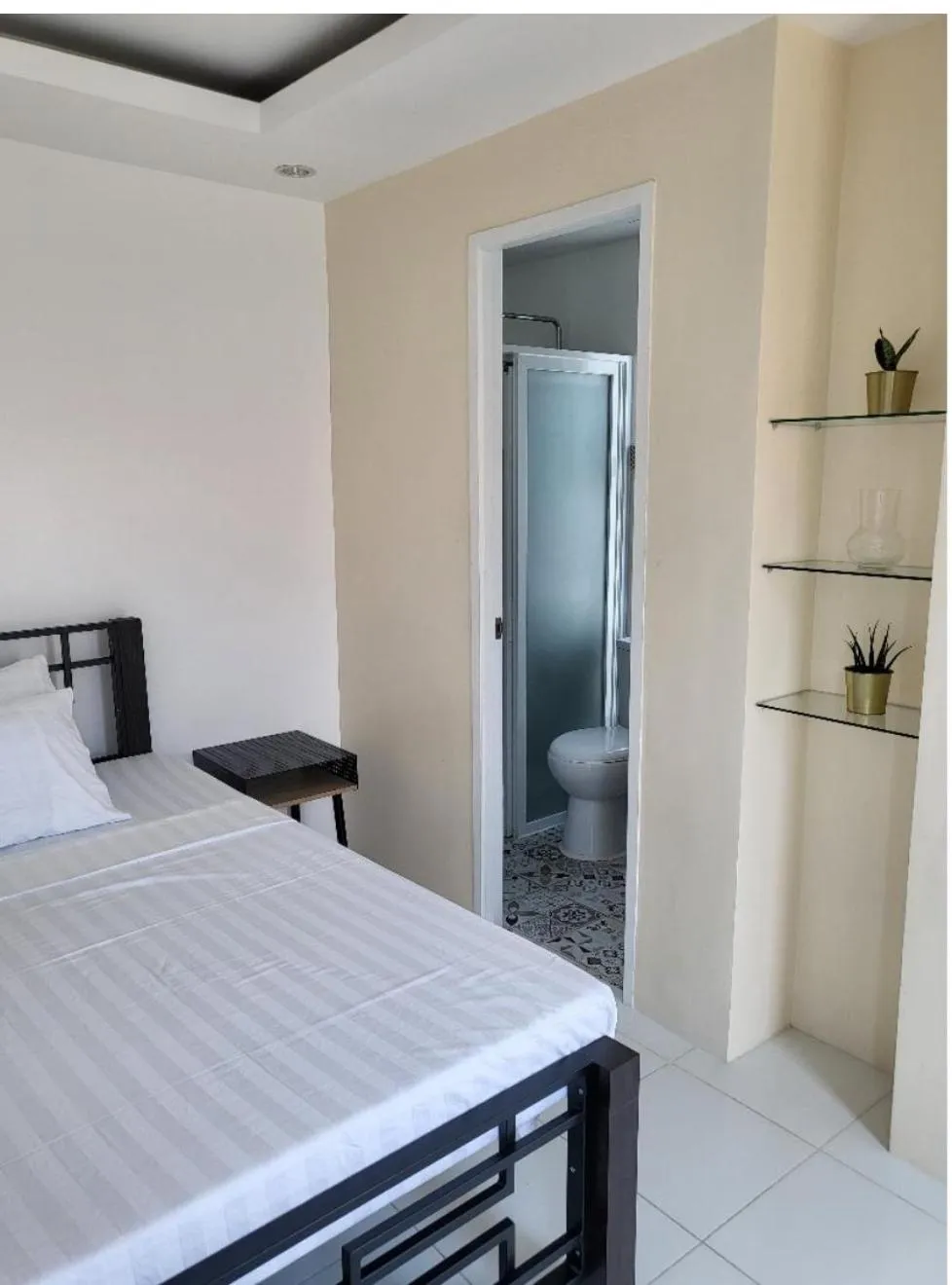 Bed in Nine Balconies Island Stay