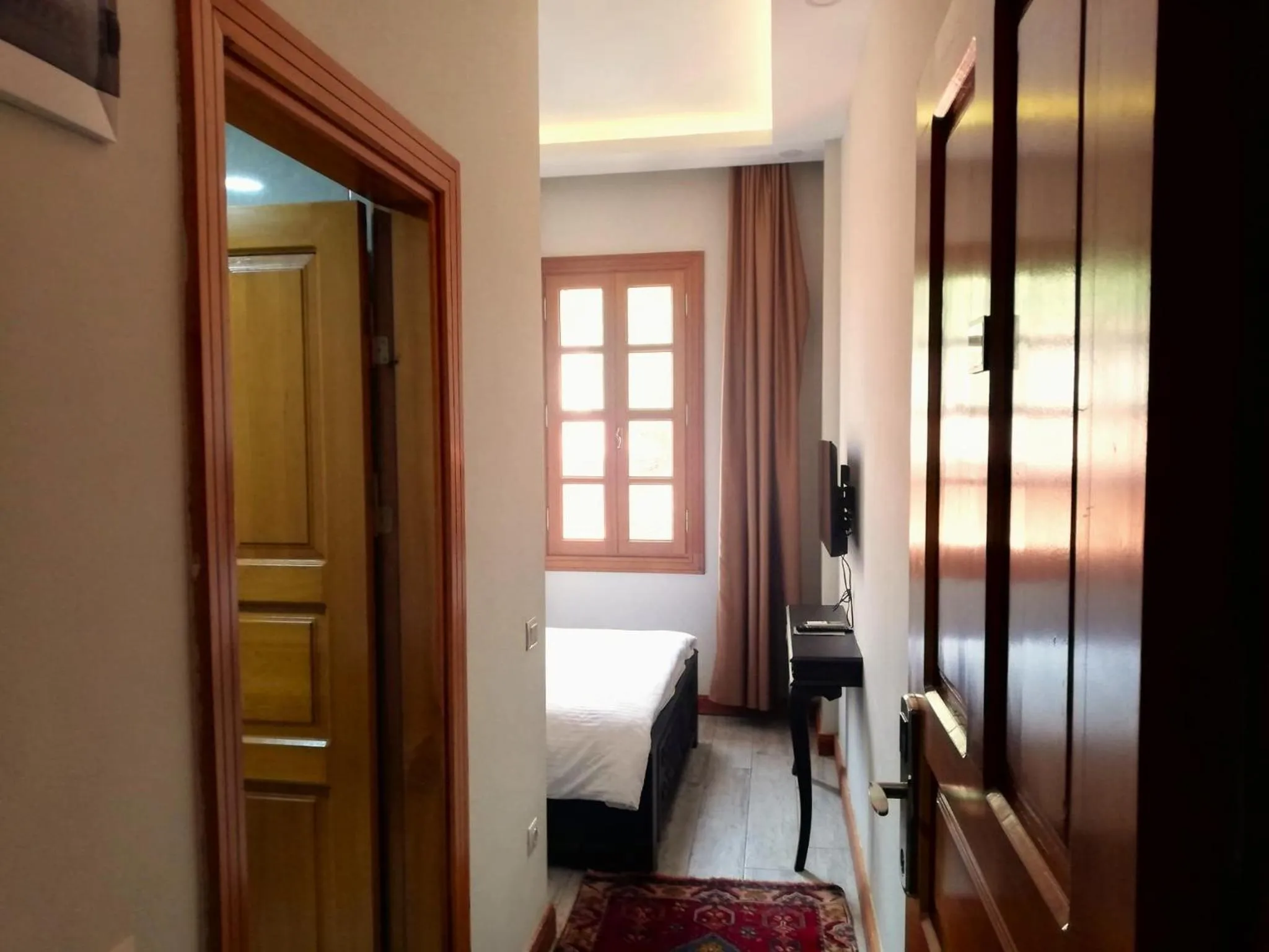 Photo of the whole room in WOO Town Suites