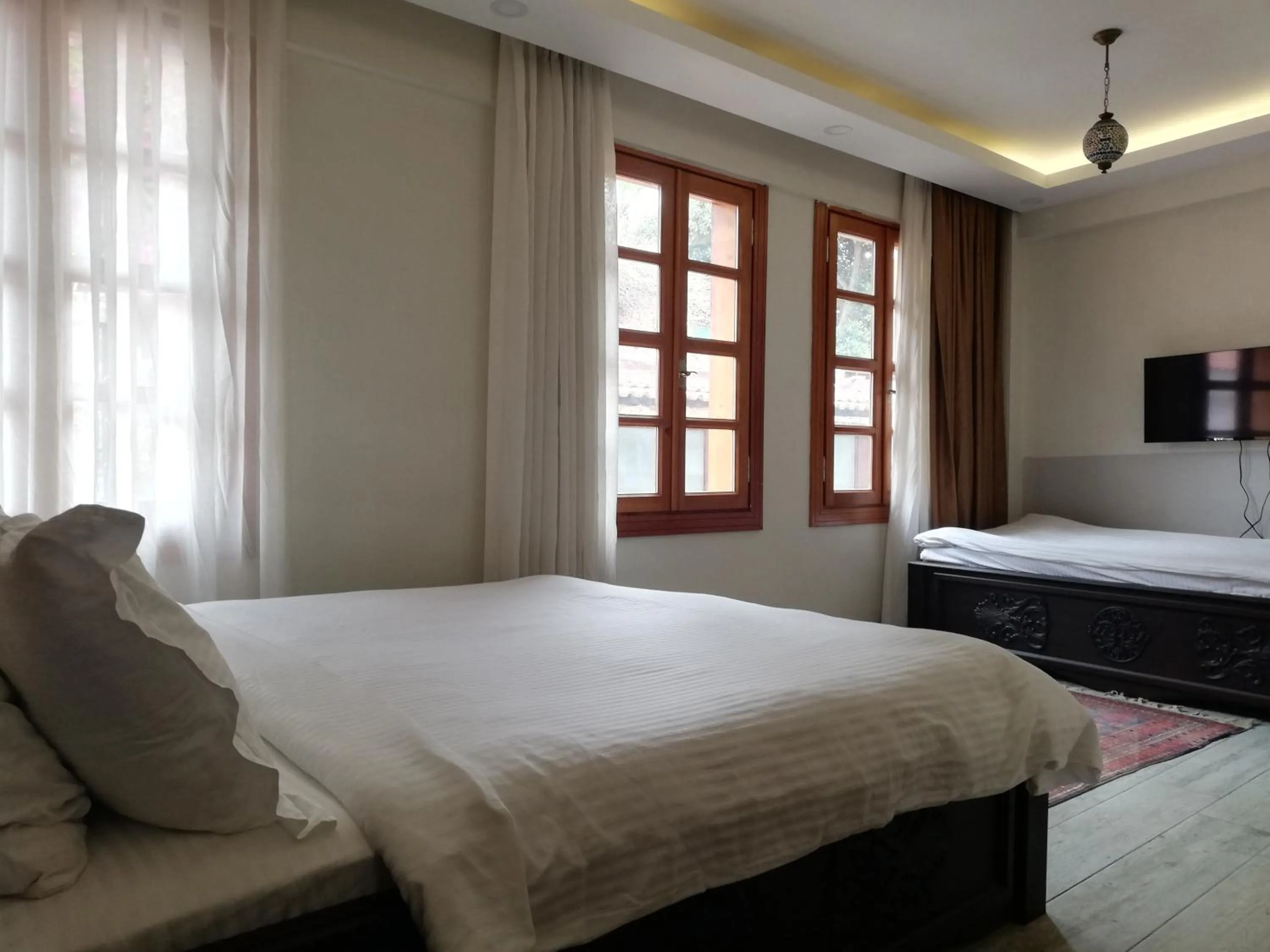 Photo of the whole room in WOO Town Suites