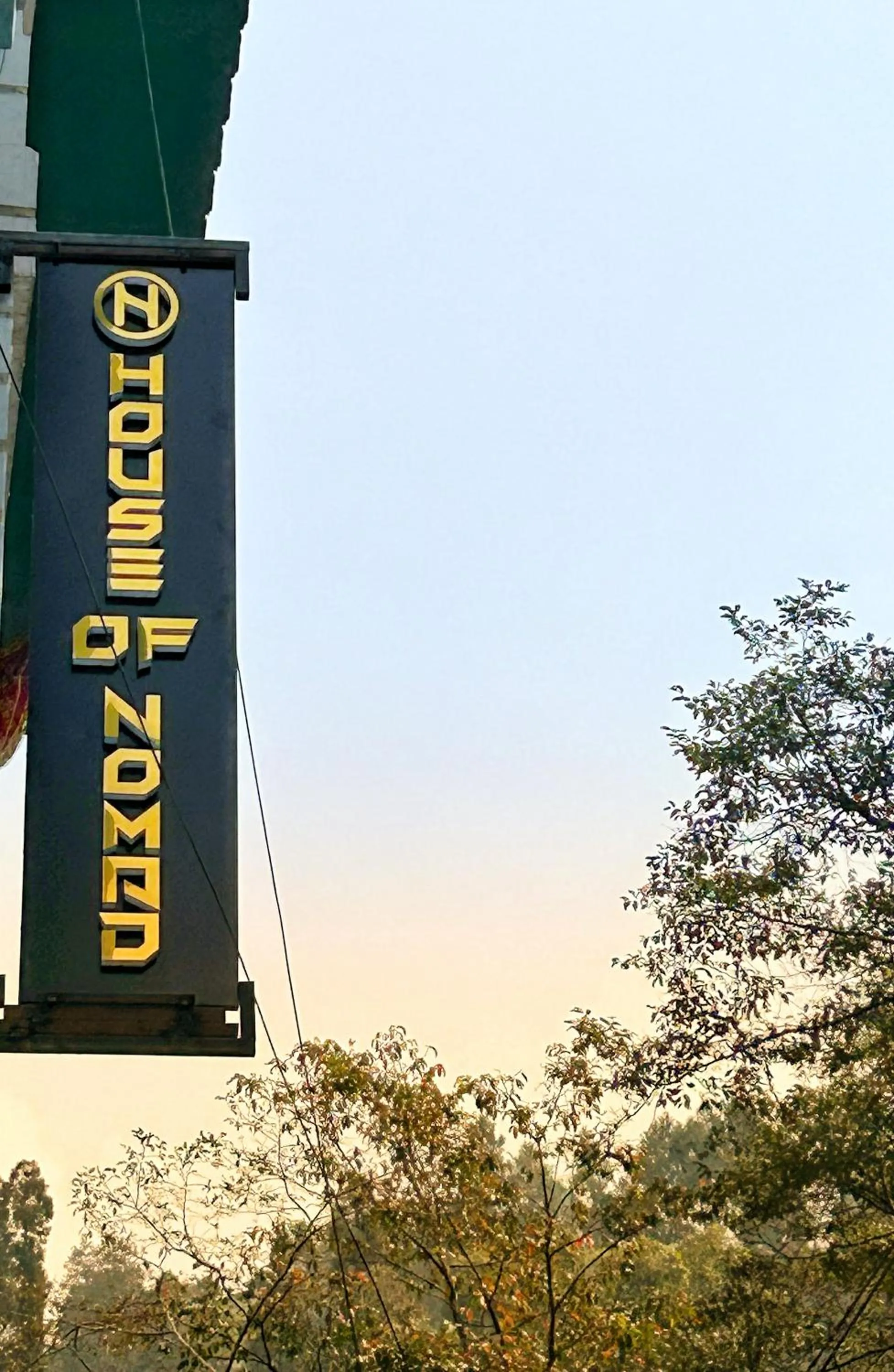 Property logo or sign in House of Nomad