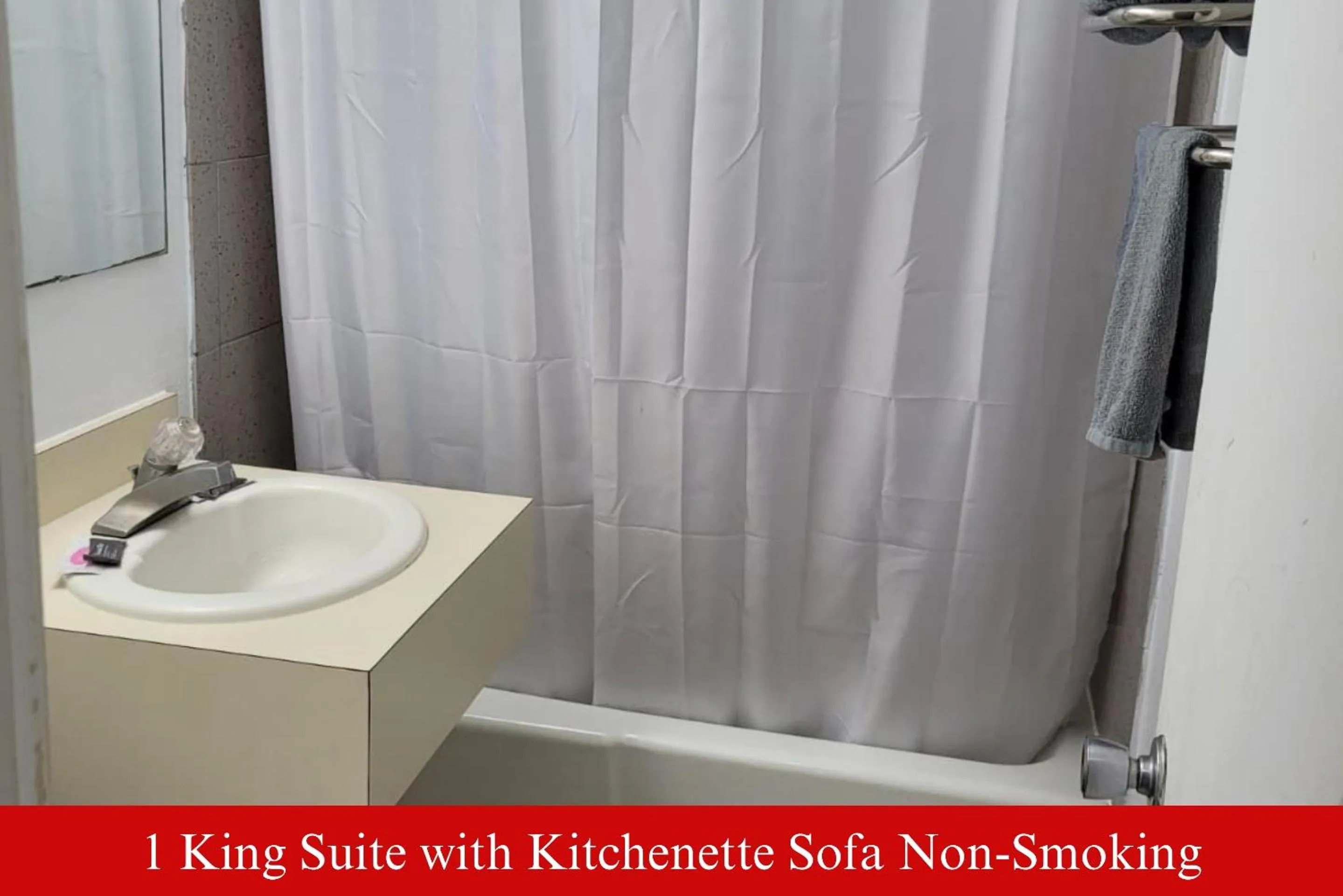 Bathroom in Coratel Inn & Suites by Jasper Hutchinson