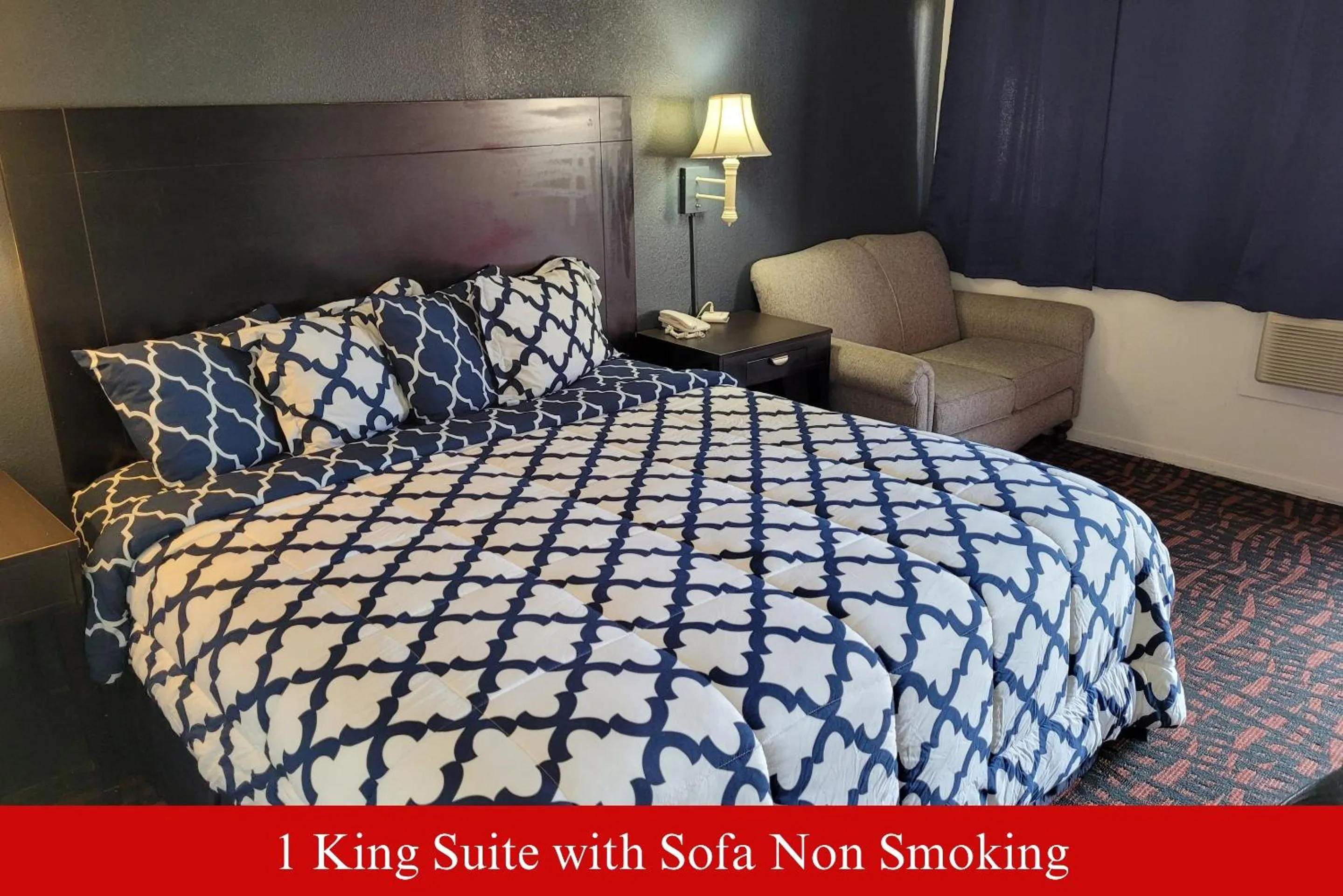 Bed in Coratel Inn & Suites by Jasper Hutchinson