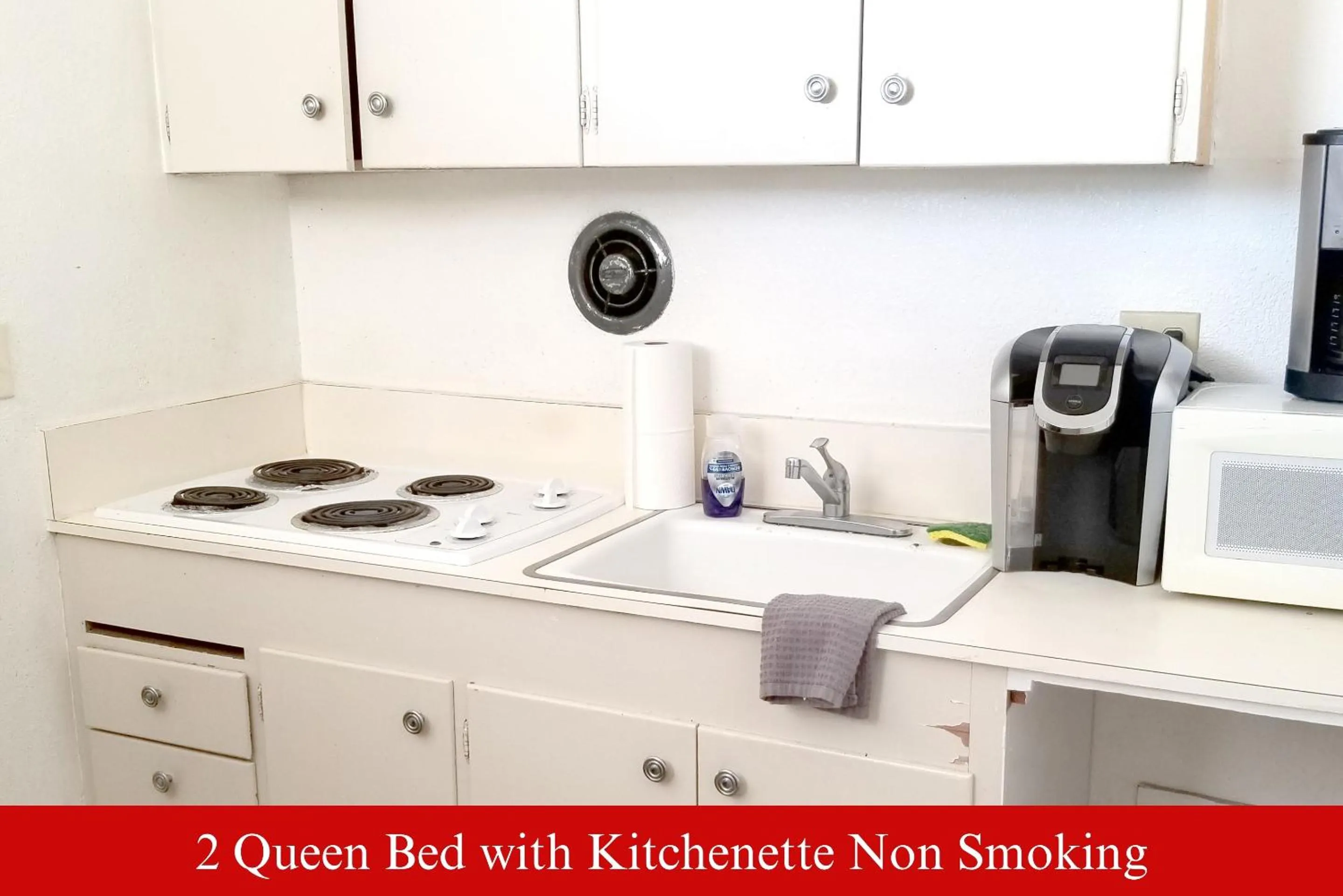 Kitchen or kitchenette in Coratel Inn & Suites by Jasper Hutchinson