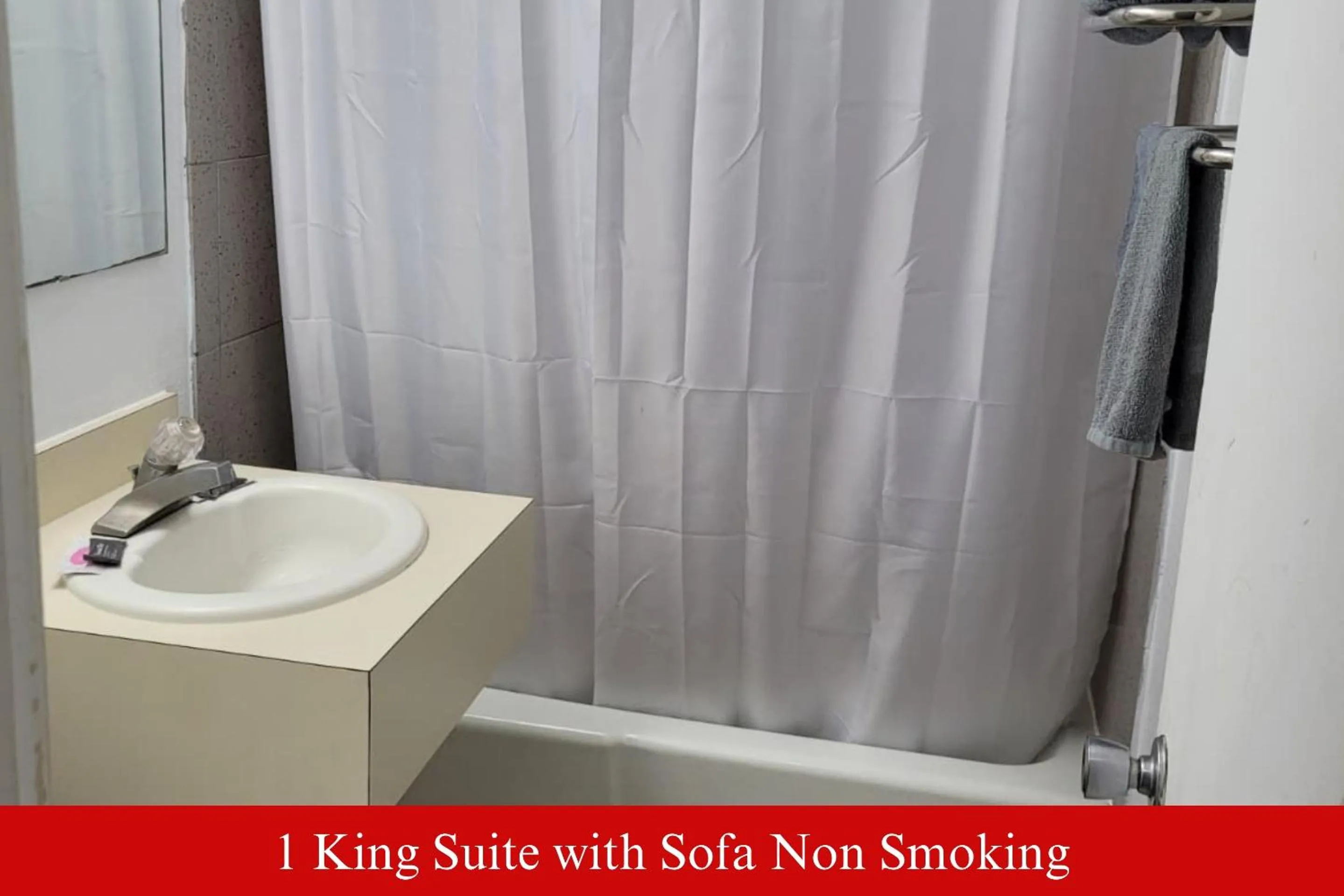 Bathroom in Coratel Inn & Suites by Jasper Hutchinson