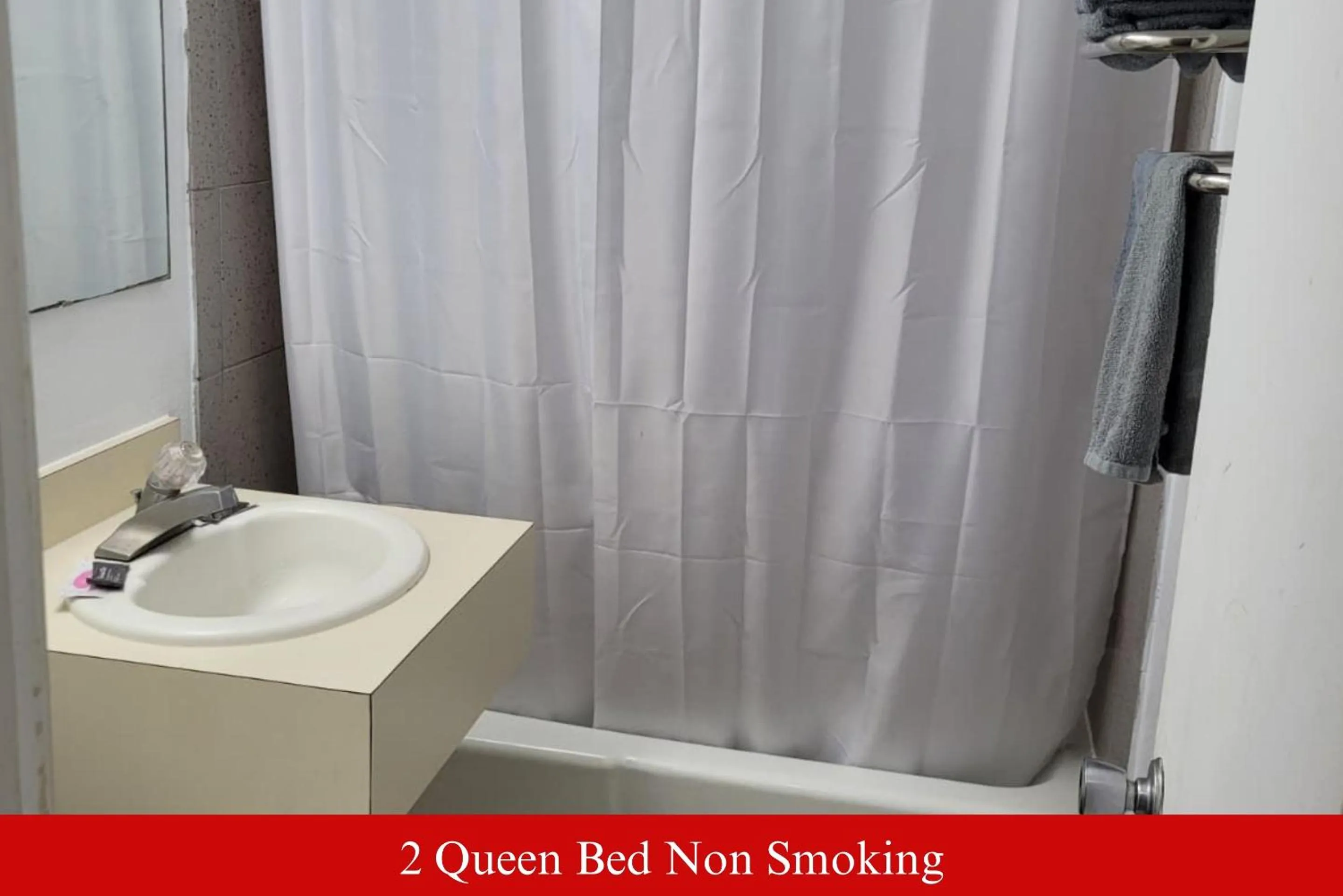 Bathroom in Coratel Inn & Suites by Jasper Hutchinson