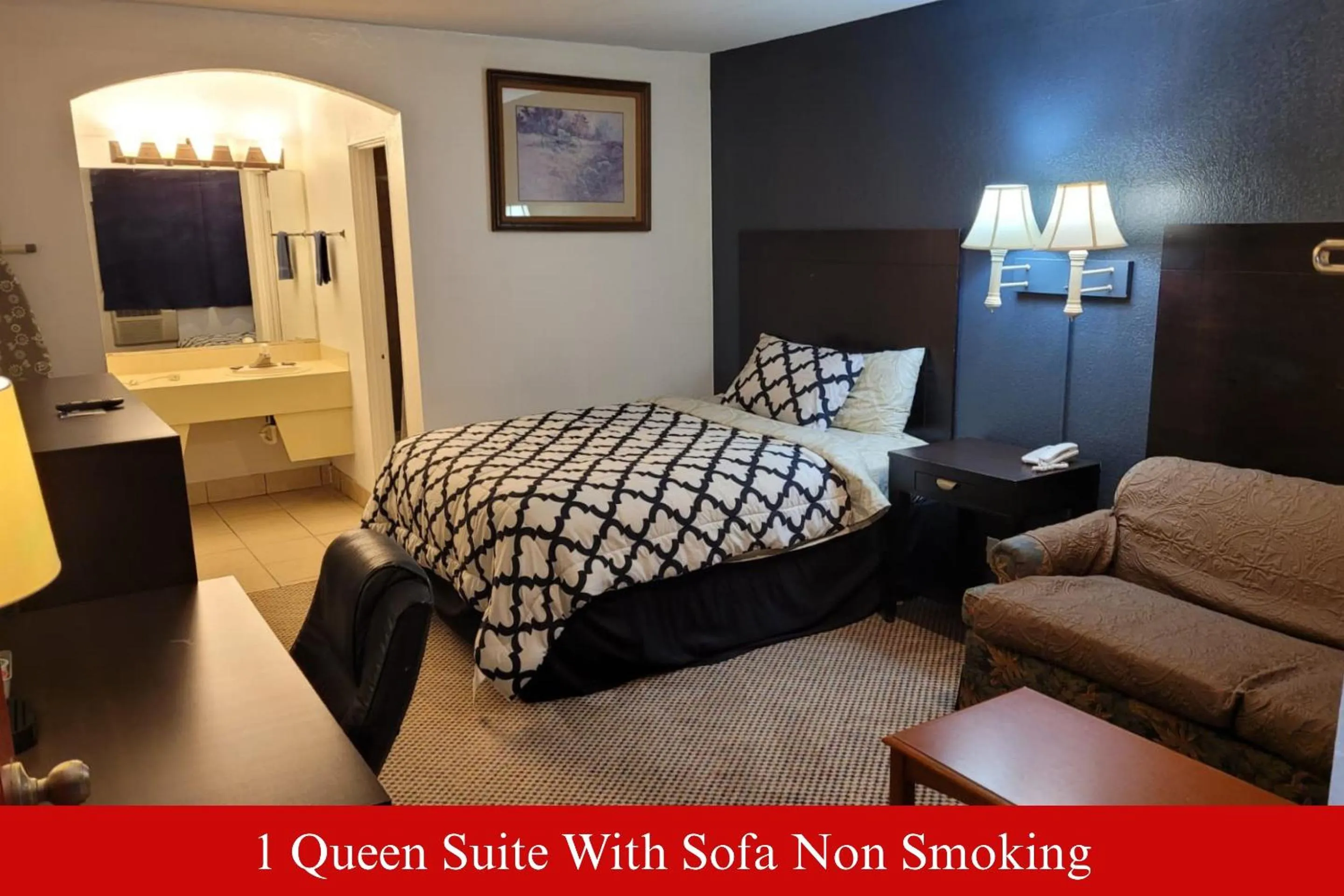 Bed in Coratel Inn & Suites by Jasper Hutchinson