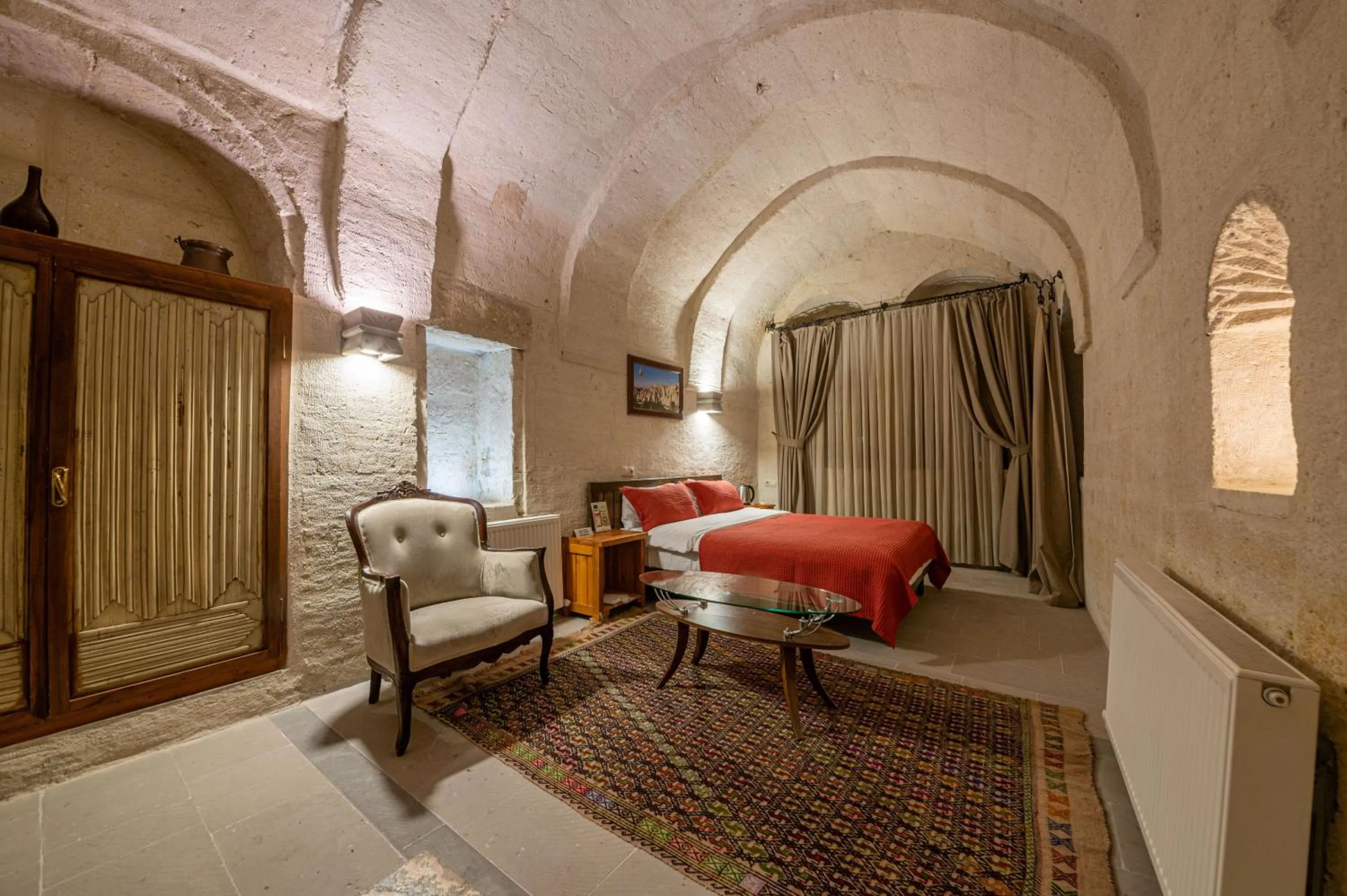 Bed in Kapalos Cave Hotel