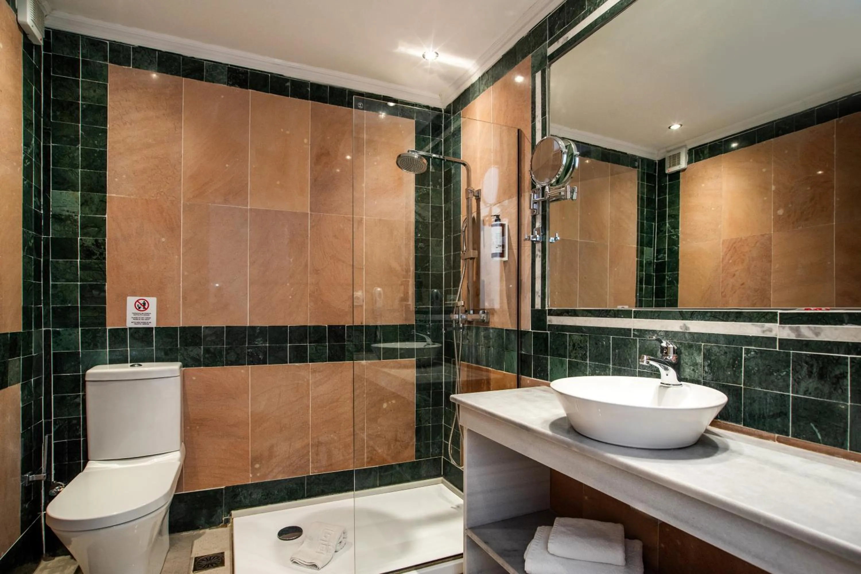 Bathroom in Cavomarina Beach- Adults Only