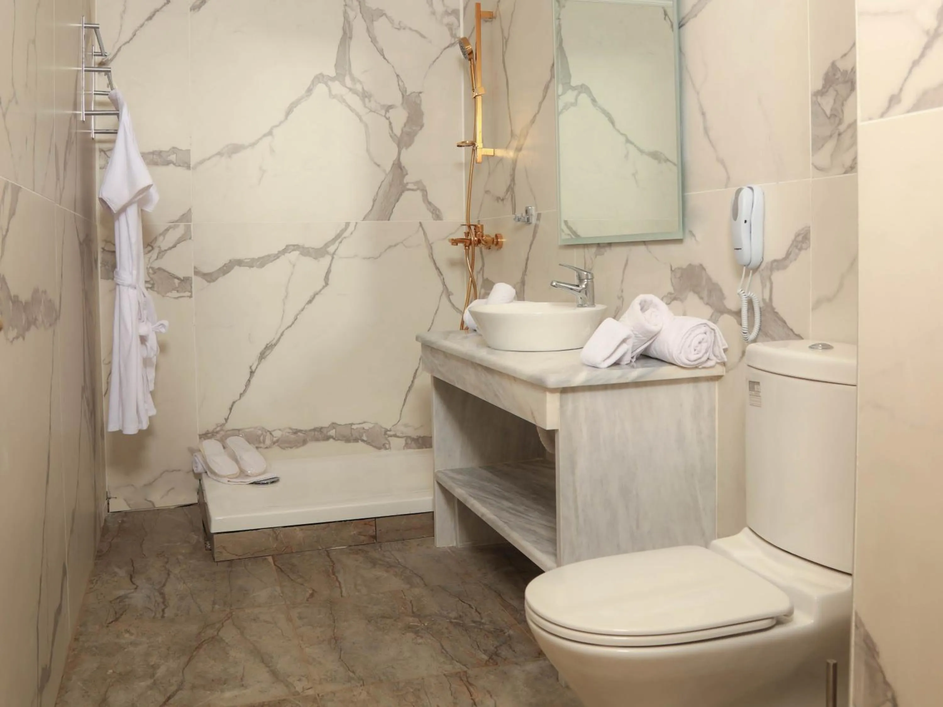 Bathroom in Cavomarina Beach- Adults Only