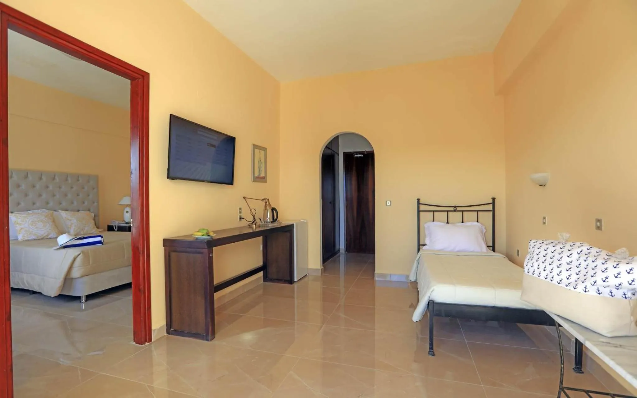 Communal lounge/ TV room, Bed in Cavomarina Beach- Adults Only