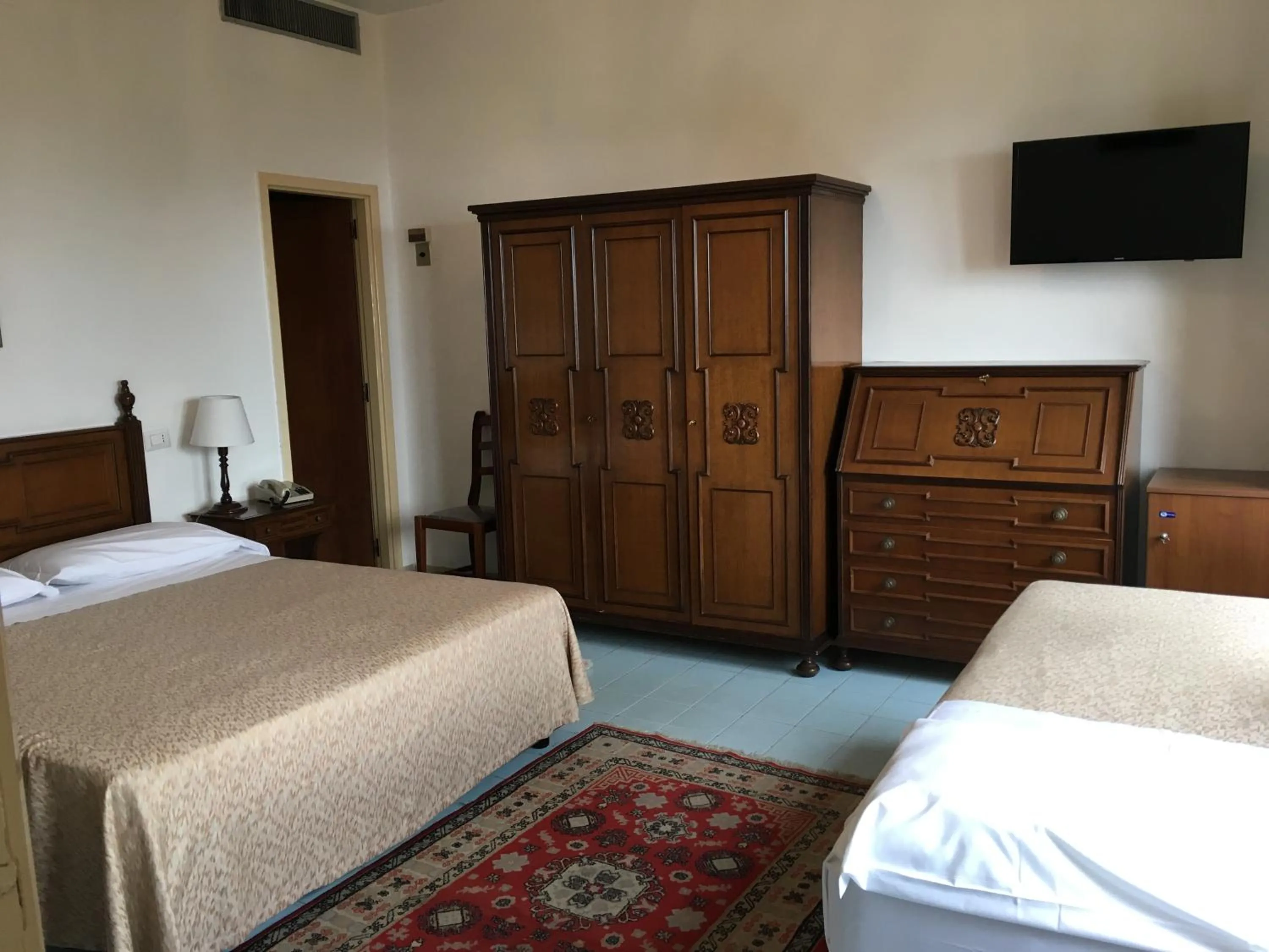 Bed in Hotel Mediterranée