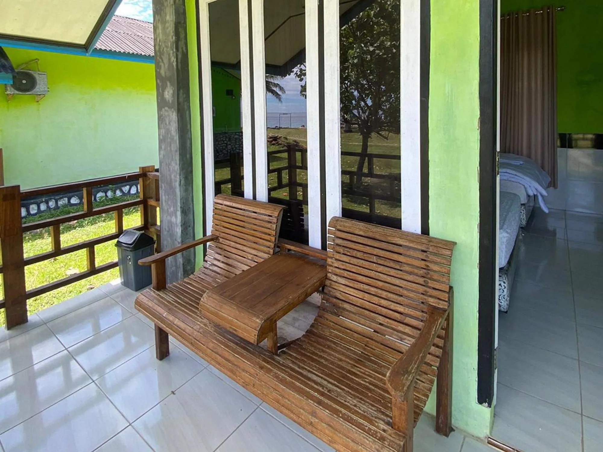 Seating area in RedDoorz Syariah near Ujong Kareung Beach Sabang