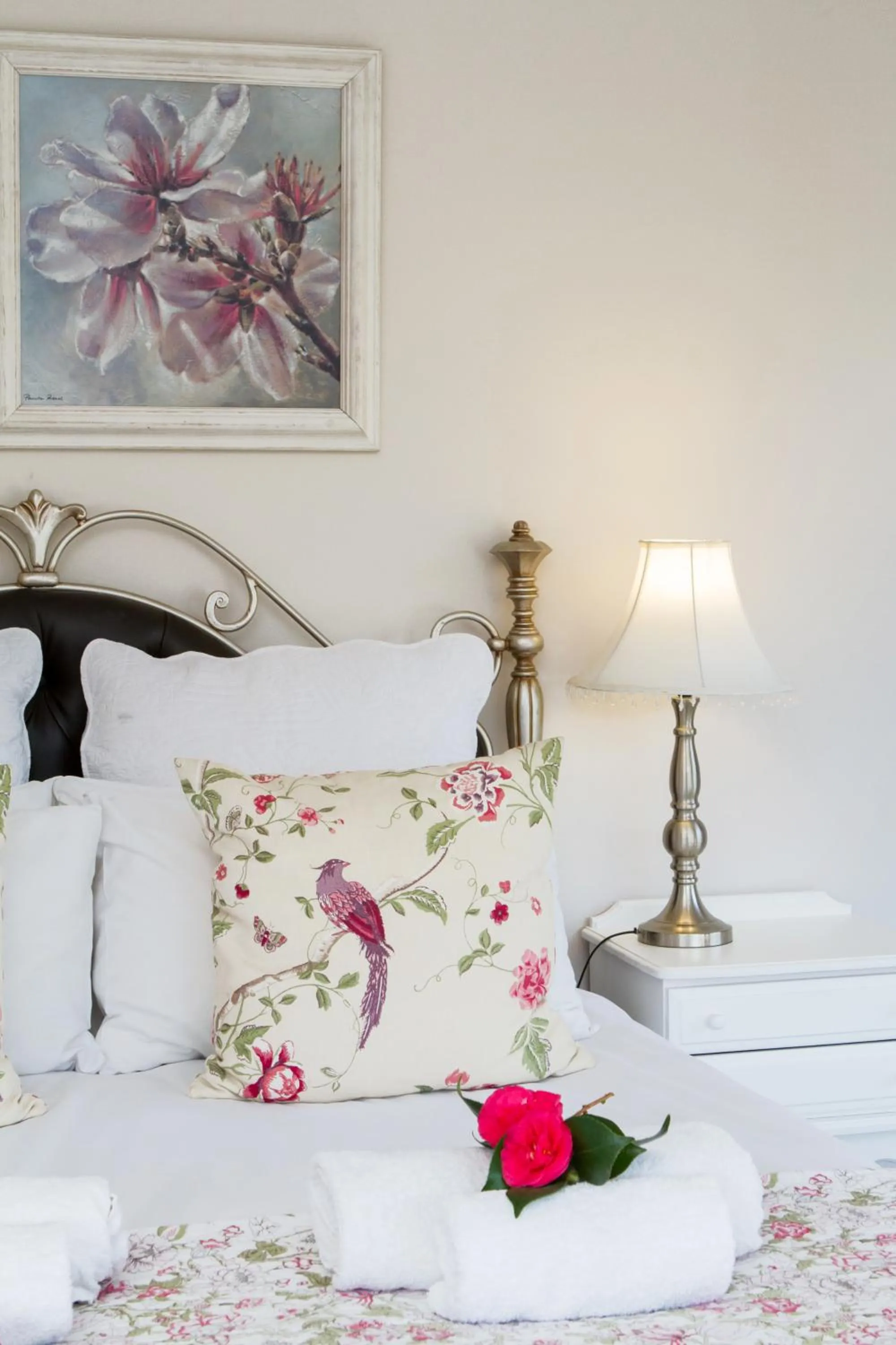 Decorative detail, Bed in Cherry Berry Guest House