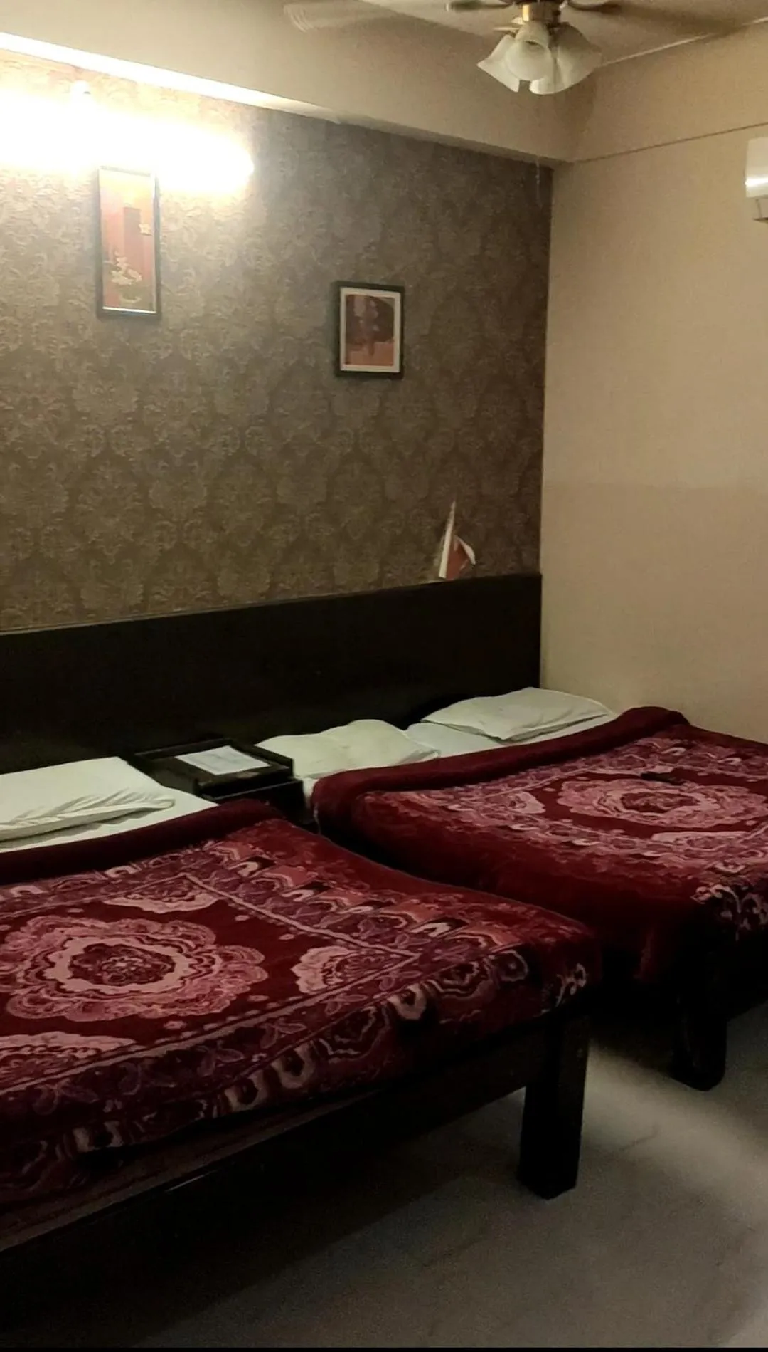 Bed in Raj Residency Mysuru