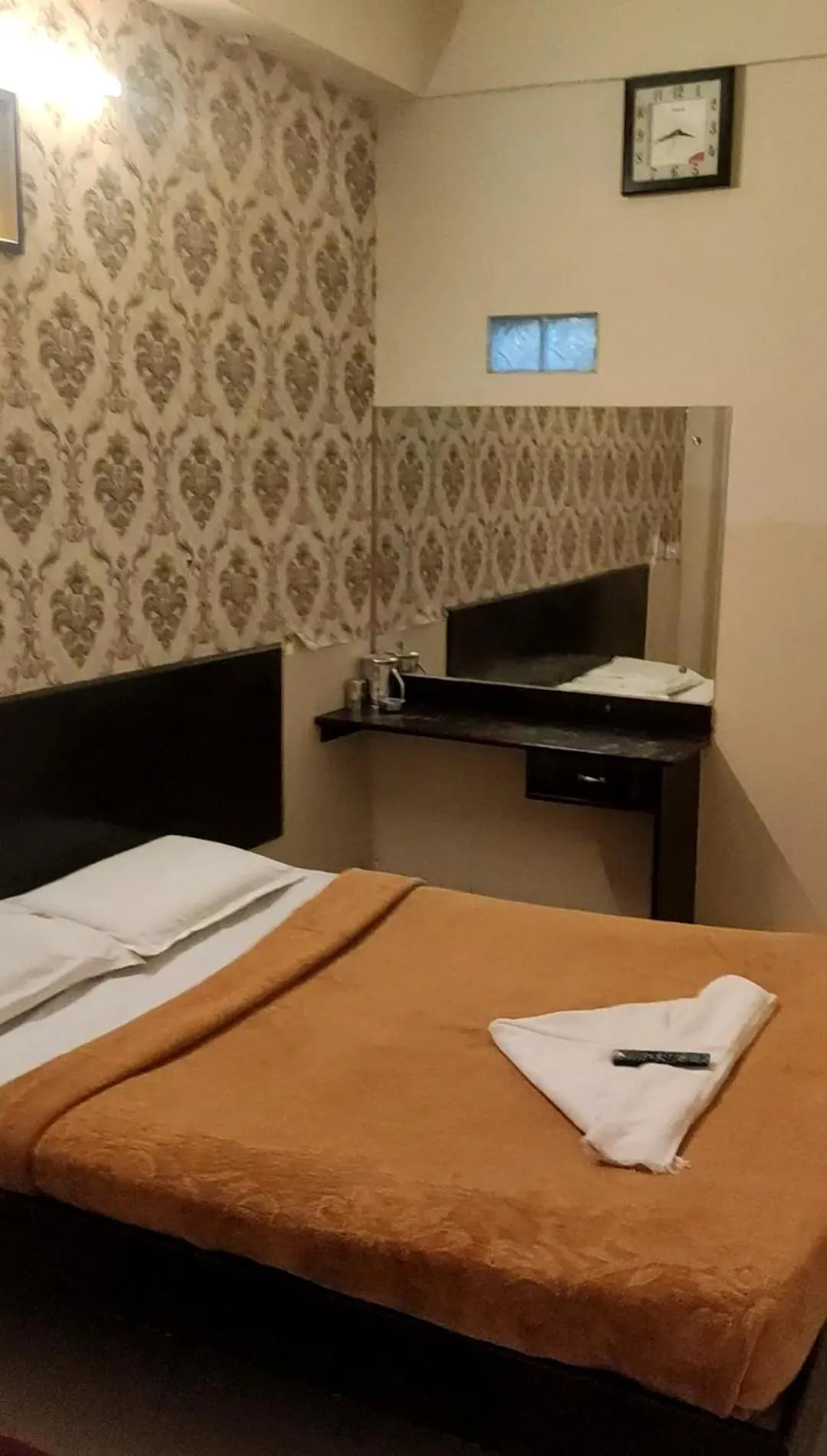 Bed in Raj Residency Mysuru