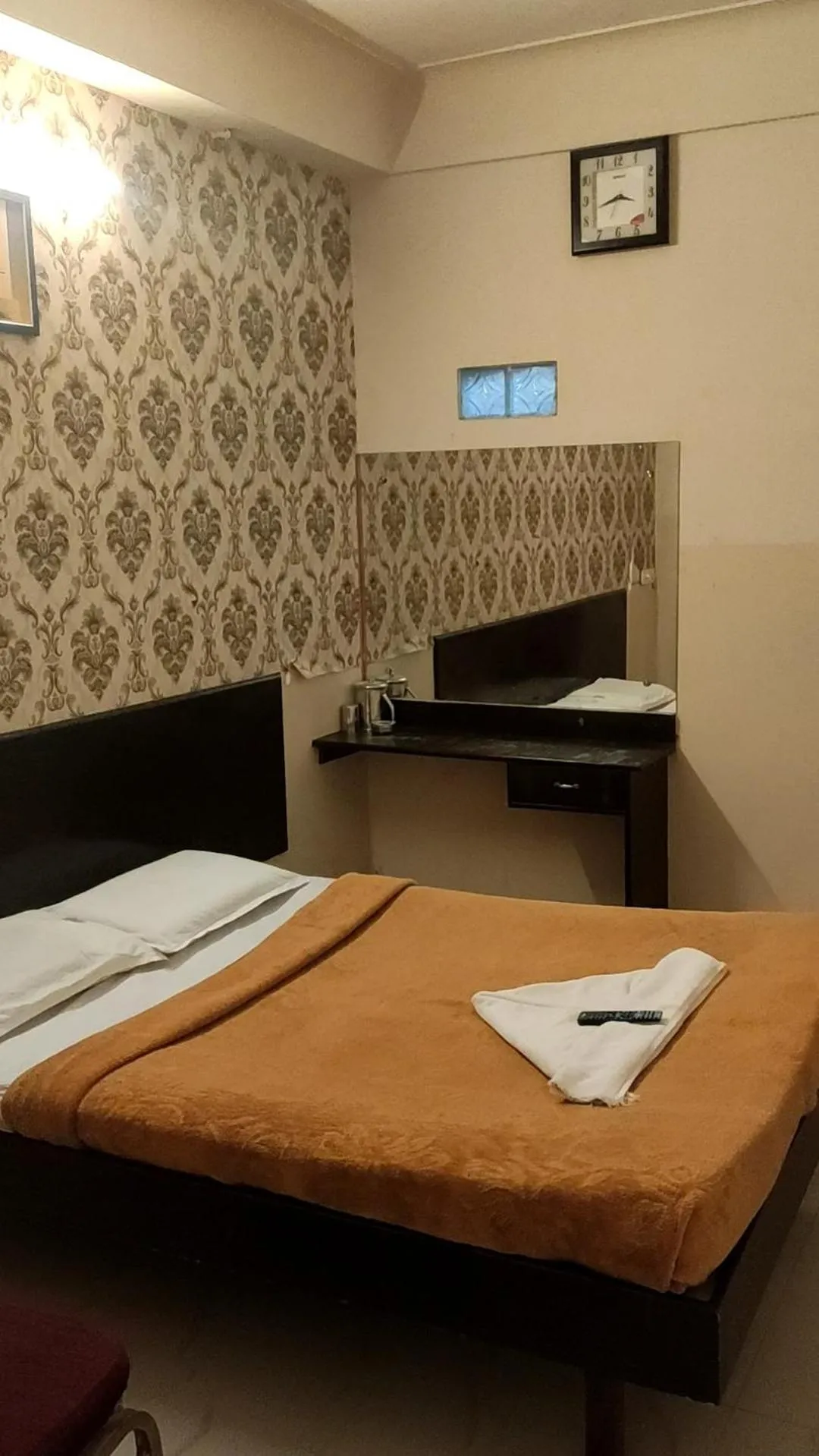 Bed in Raj Residency Mysuru