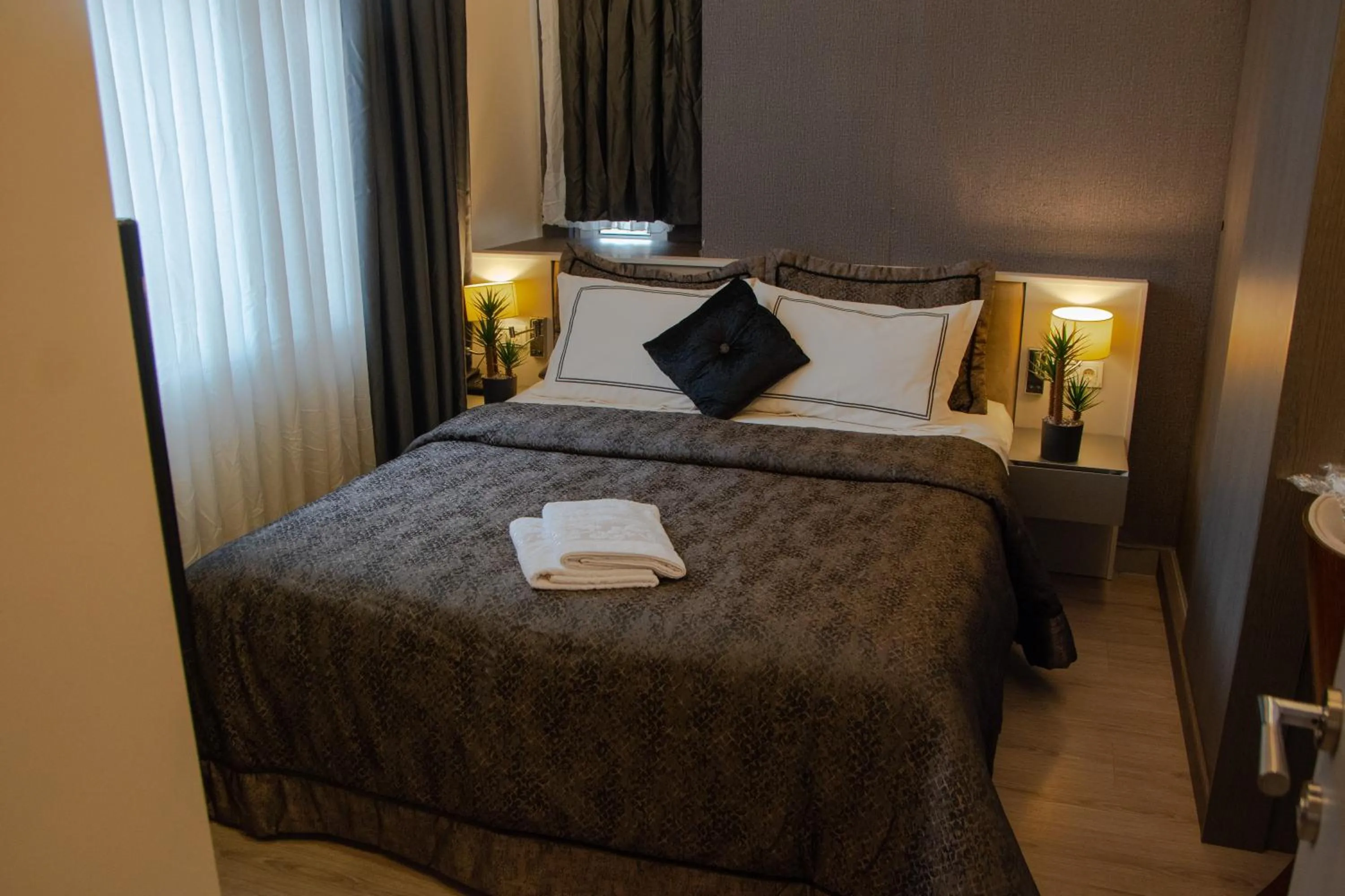 Bed in Star of İstanbul Residence