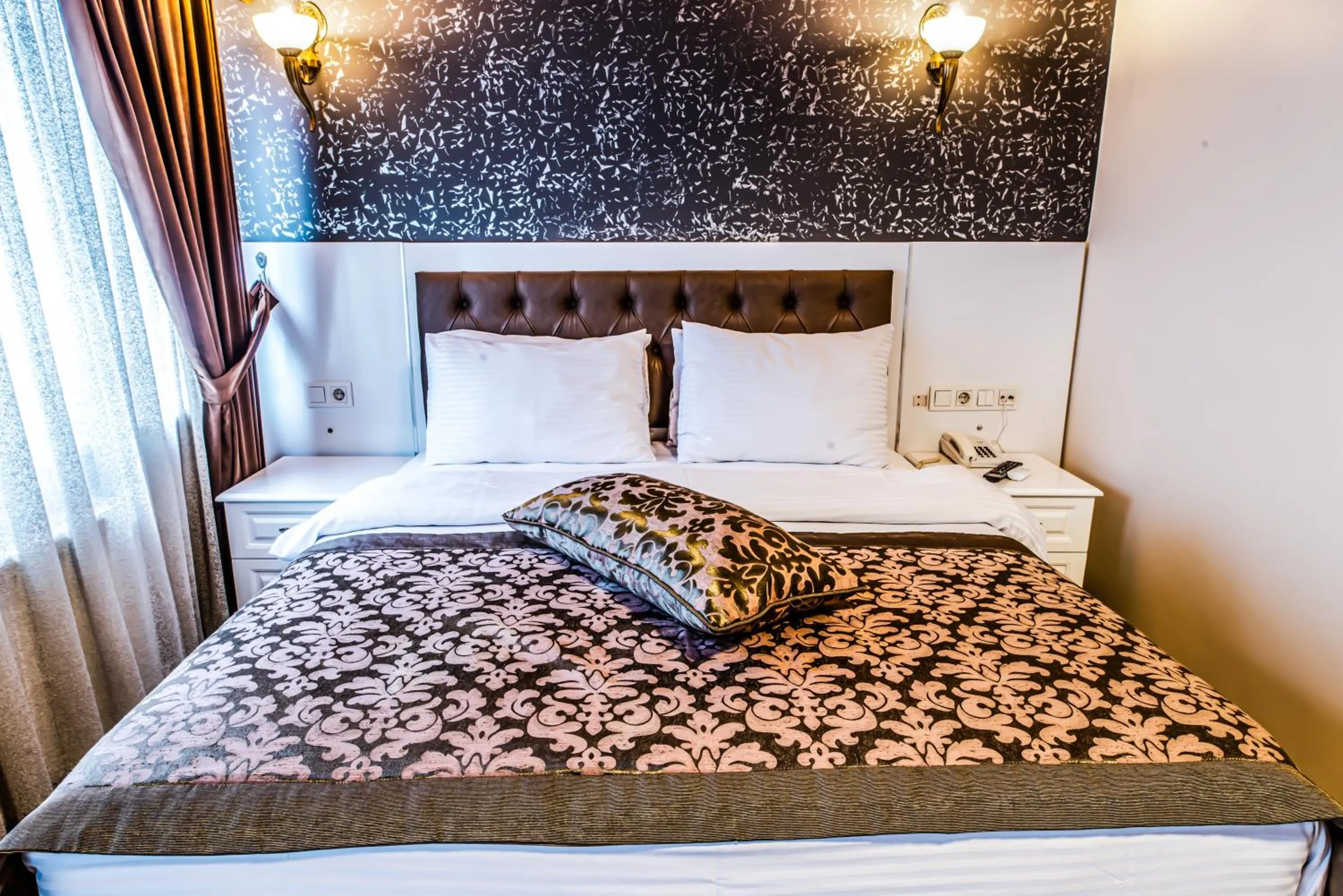 Bed in Lazz City Hotel