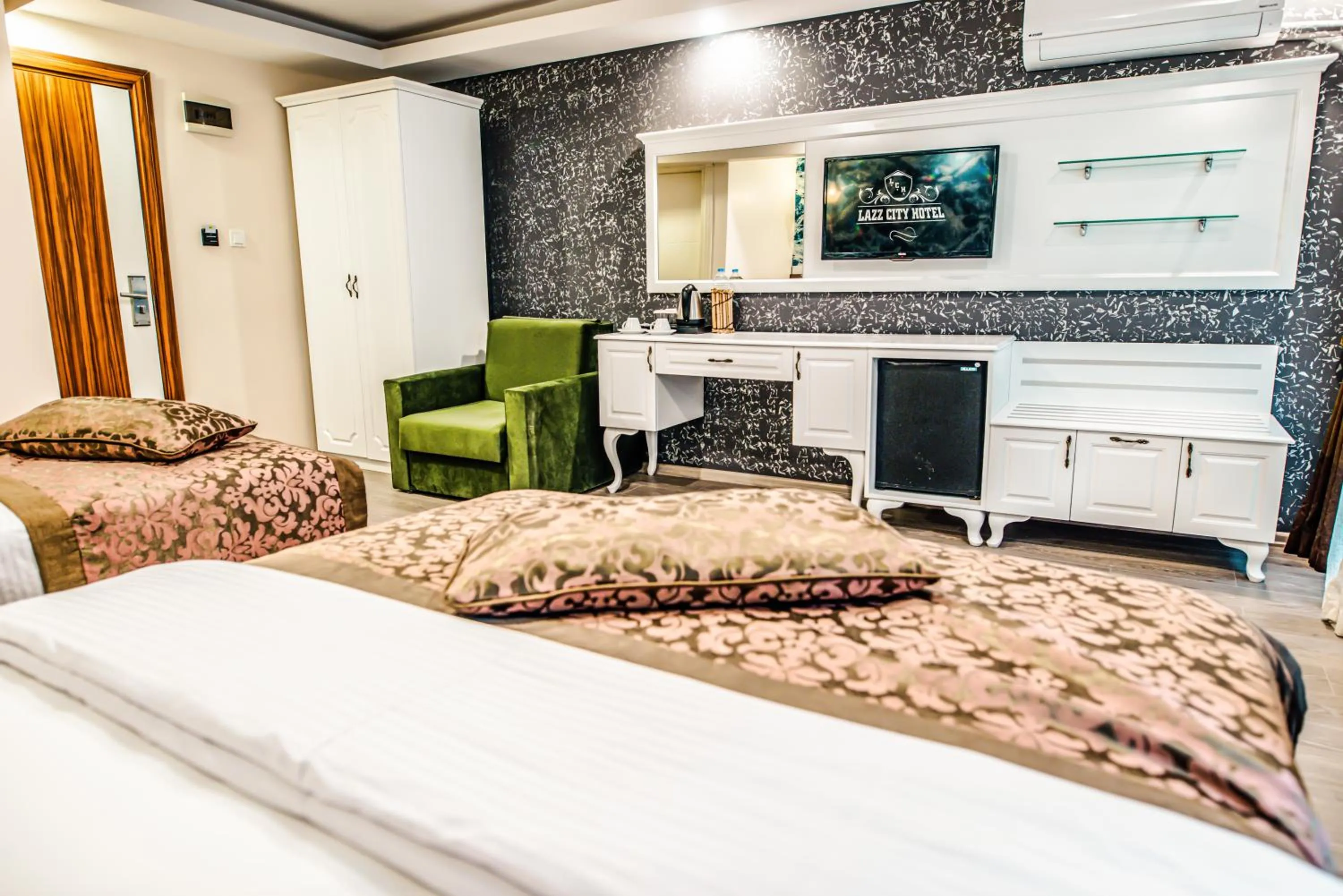 Bed in Lazz City Hotel