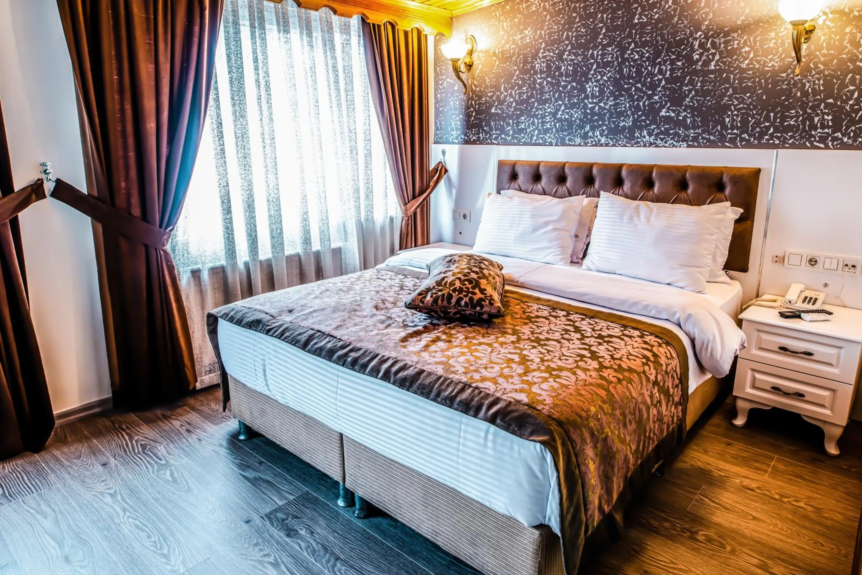 Bed in Lazz City Hotel