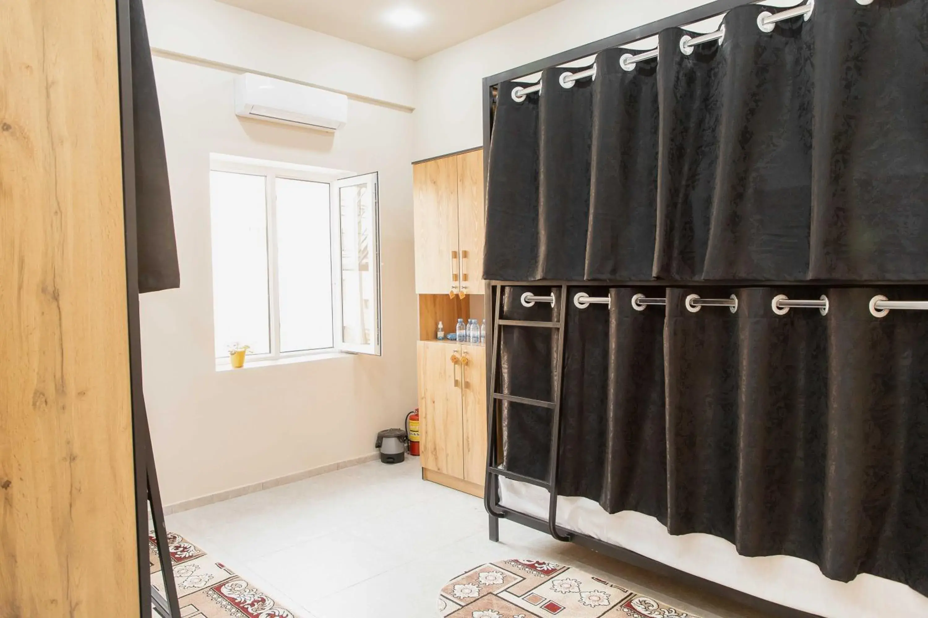 Bed in 4-Bed Female Dormitory Room in Safarov's Family Hostel Bed in 4-Bed Female Dormitory Room in Safarov's Family Hostel