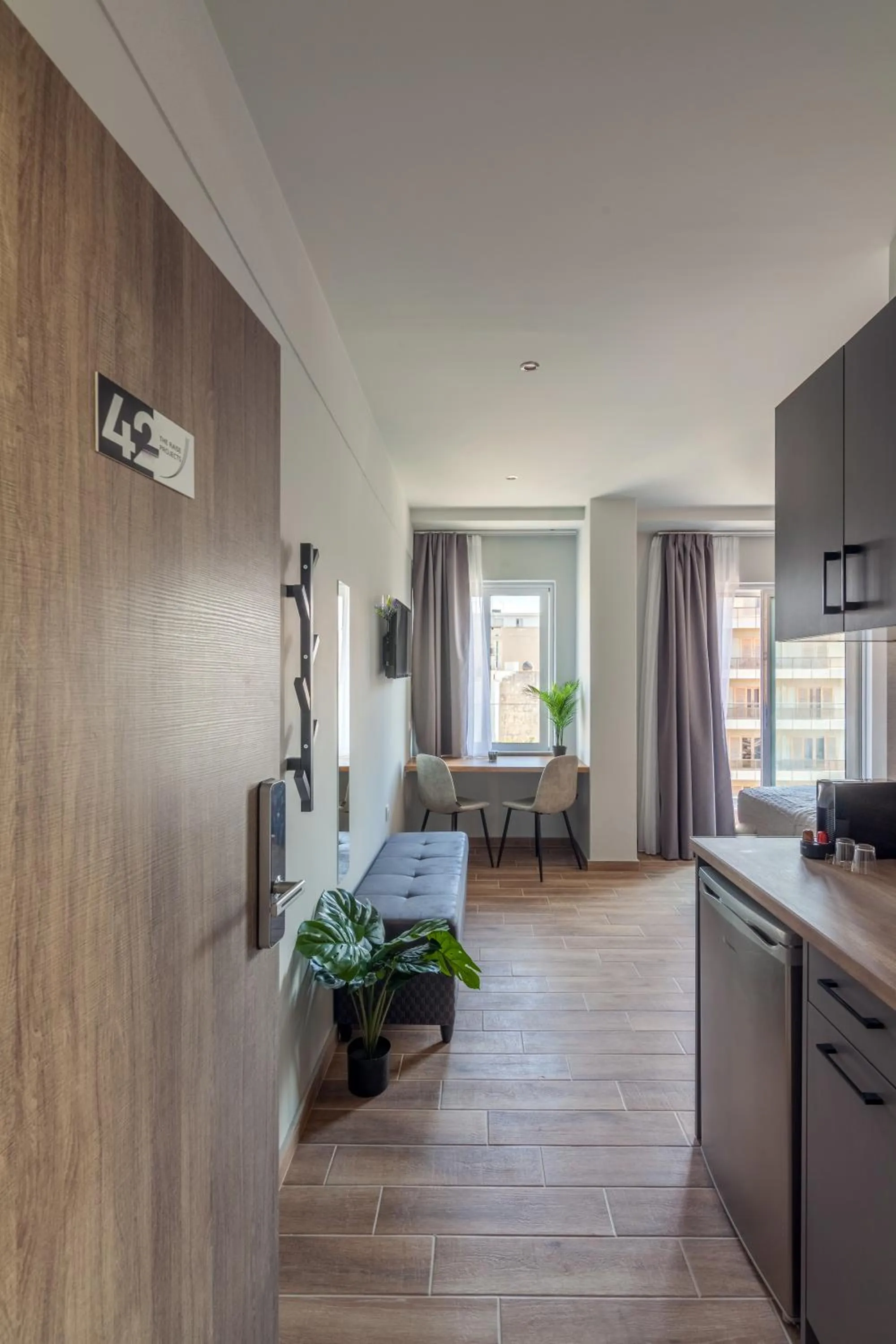 Seating area, Bed in Raise Kornarou City Stay