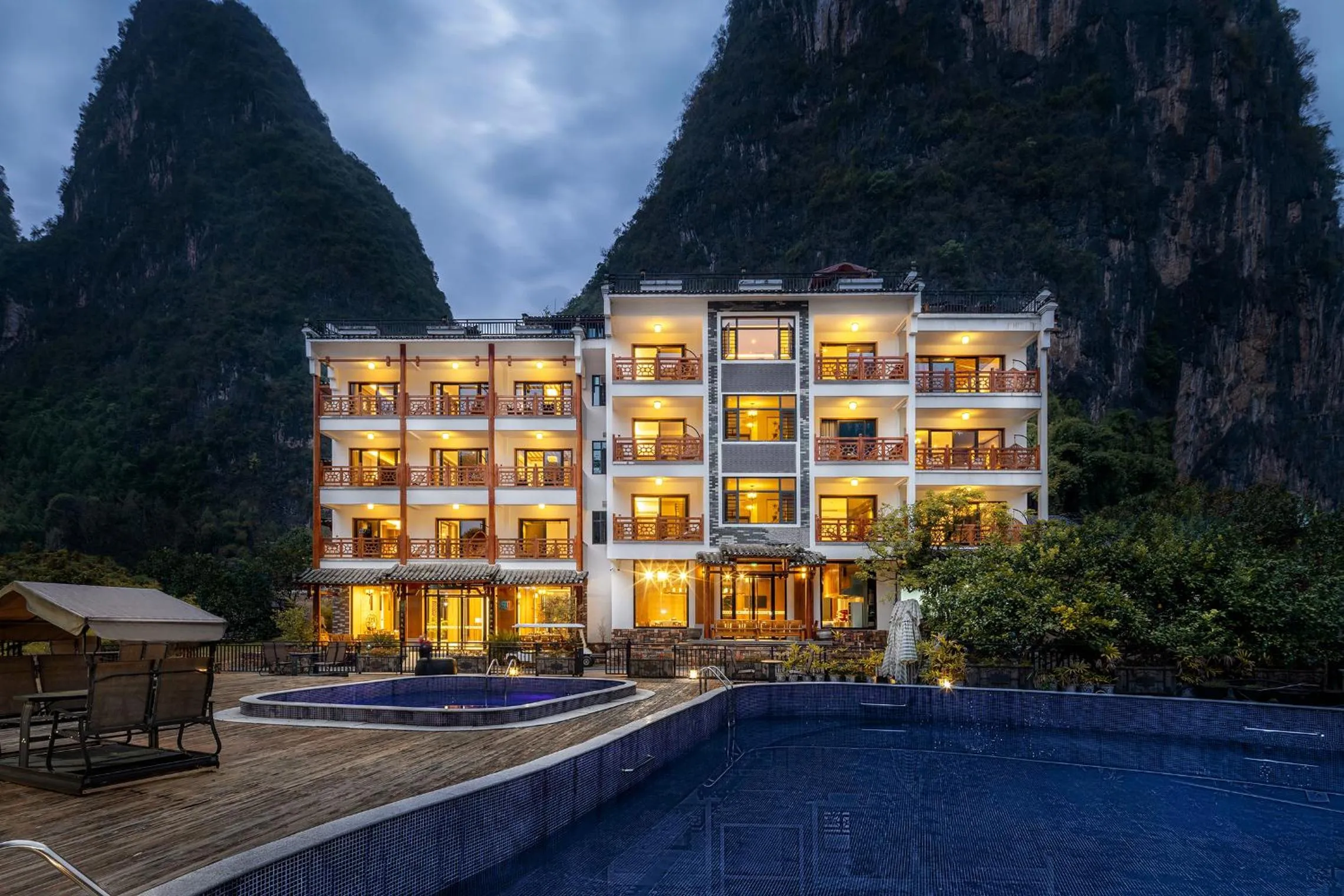 Property building in Yangshuo Mountain River Ballad Hotel - Free Yangshuo Train Station Pick Up and Drop Off