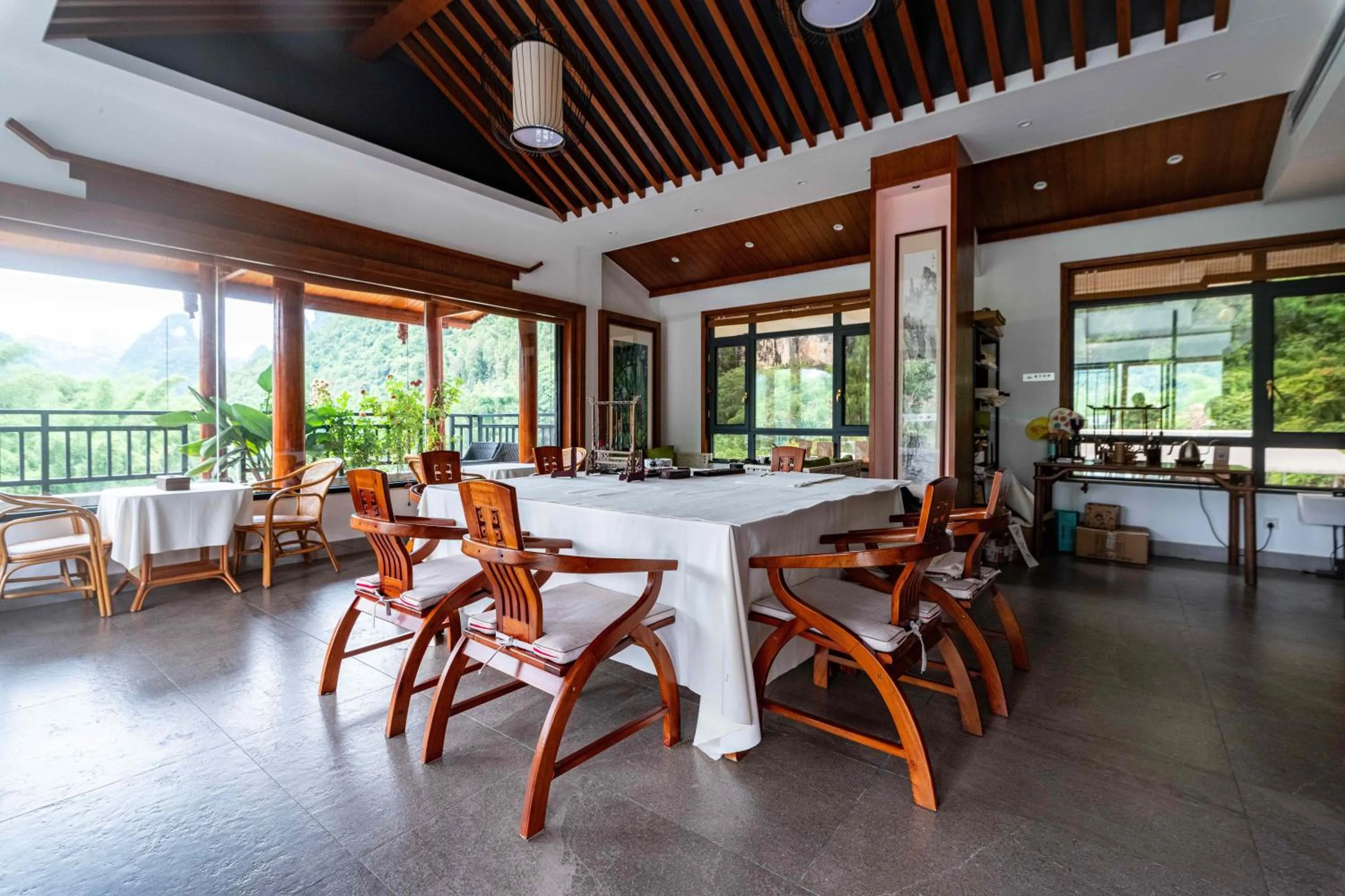 Seating area in Yangshuo Mountain River Ballad Hotel - Free Yangshuo Train Station Pick Up and Drop Off
