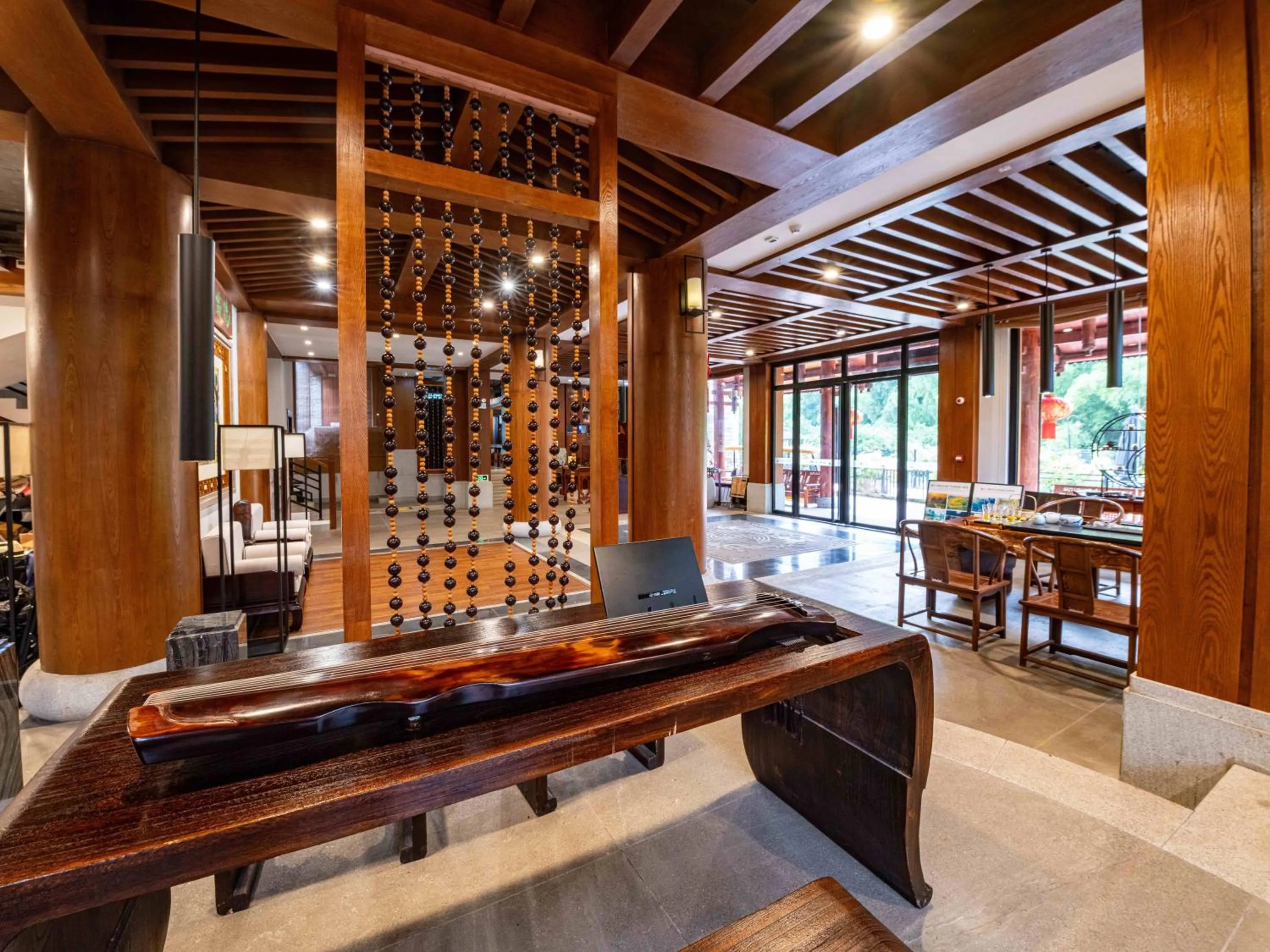 Lobby or reception in Yangshuo Mountain River Ballad Hotel - Free Yangshuo Train Station Pick Up and Drop Off