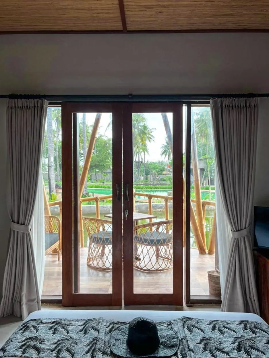 Bed in Pravasa Gili Resort by KajaNe