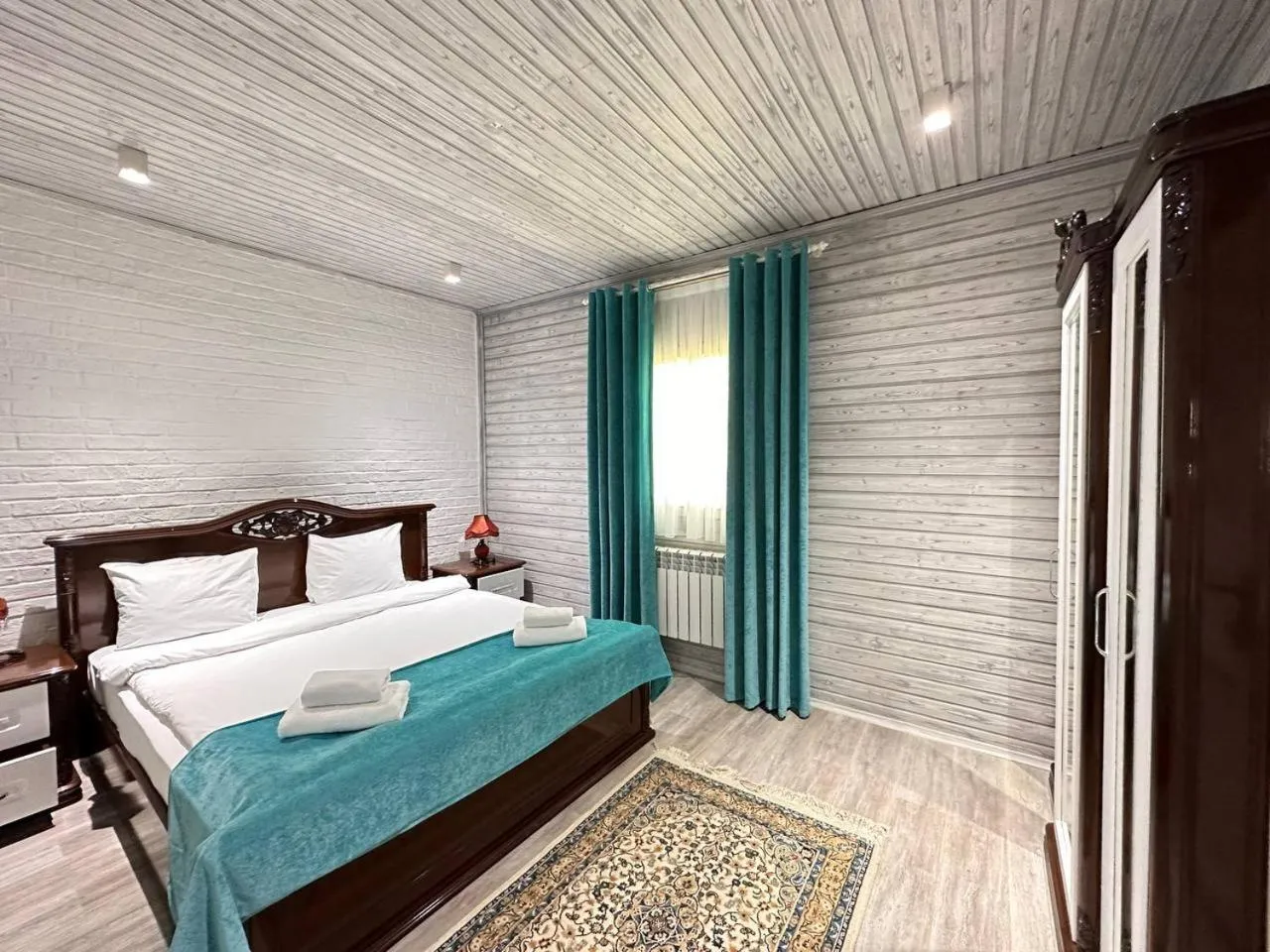 Bed in Deluxe Park Qusar Resort & Spa Hotel