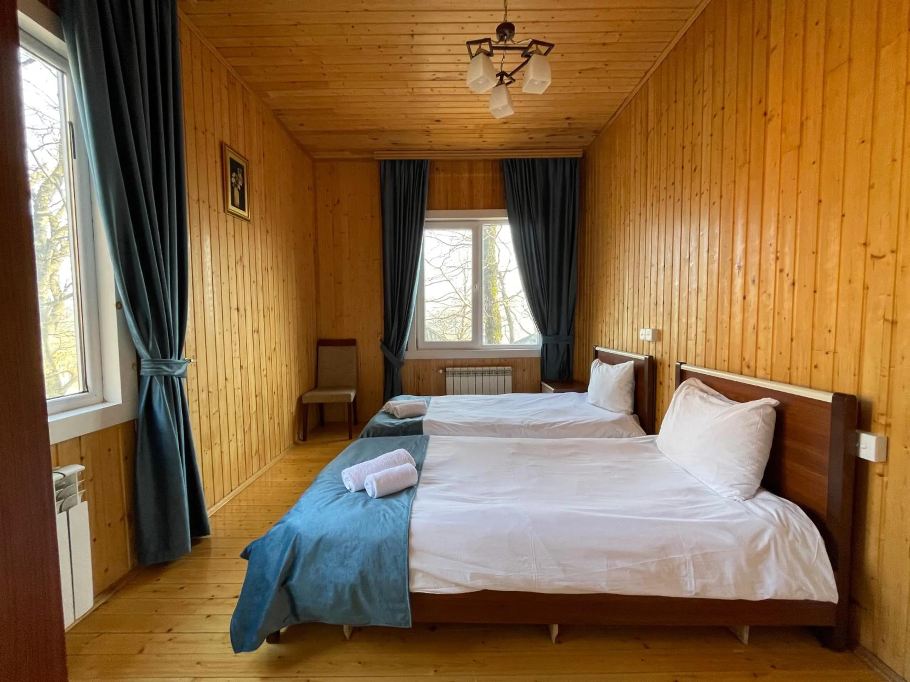 Bed in Deluxe Park Qusar Resort & Spa Hotel