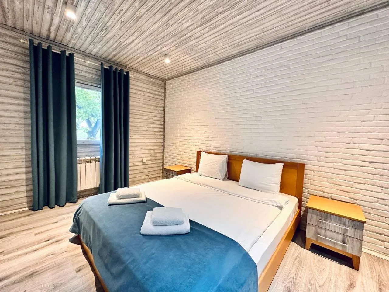 Bed in Deluxe Park Qusar Resort & Spa Hotel