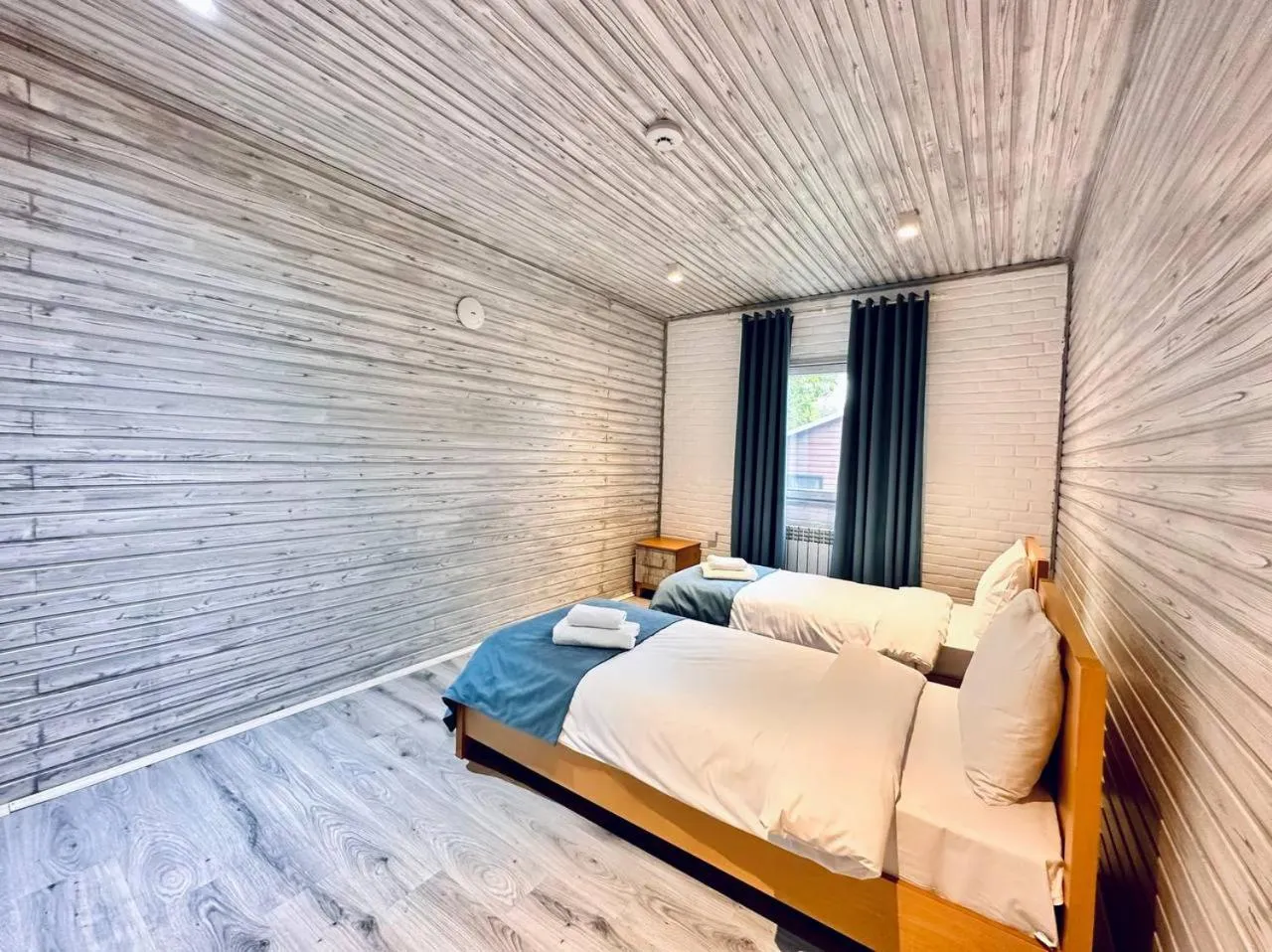 Bed in Deluxe Park Qusar Resort & Spa Hotel