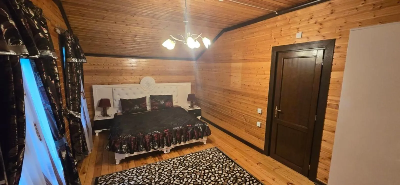 Bed in Deluxe Park Qusar Resort & Spa Hotel