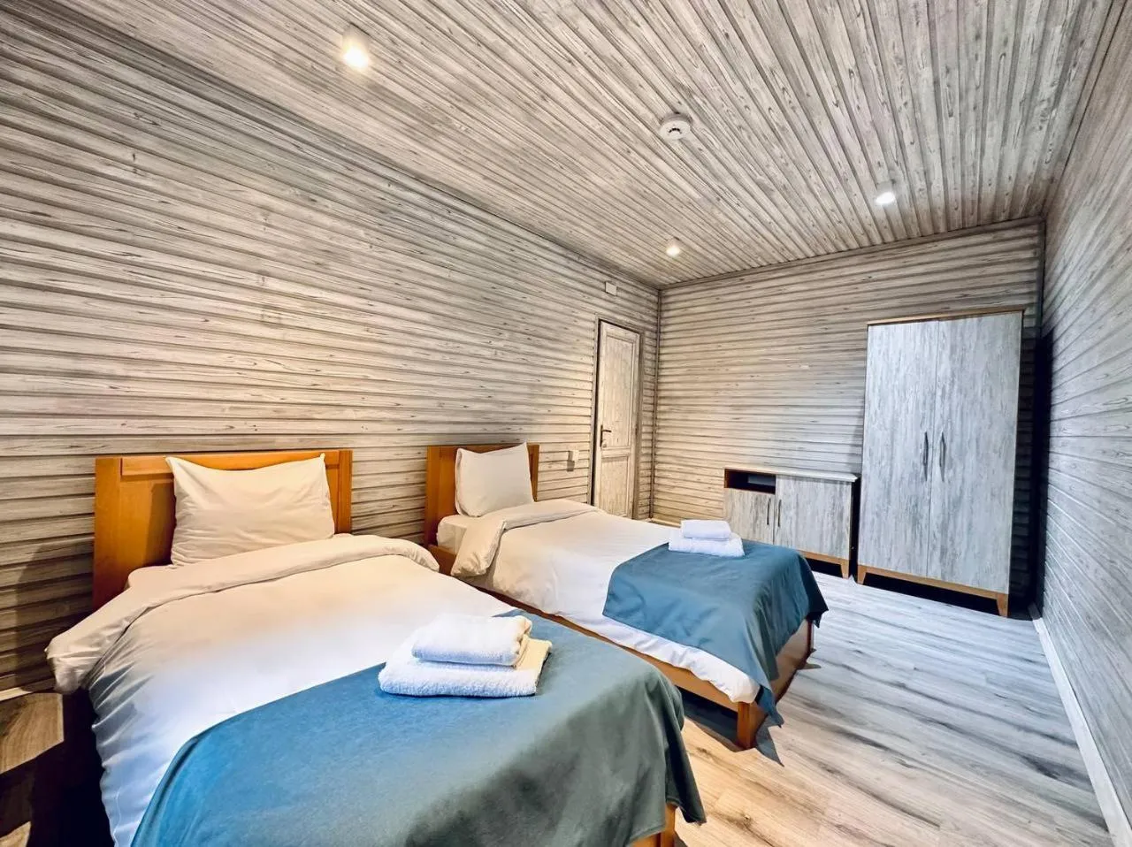 Bed in Deluxe Park Qusar Resort & Spa Hotel