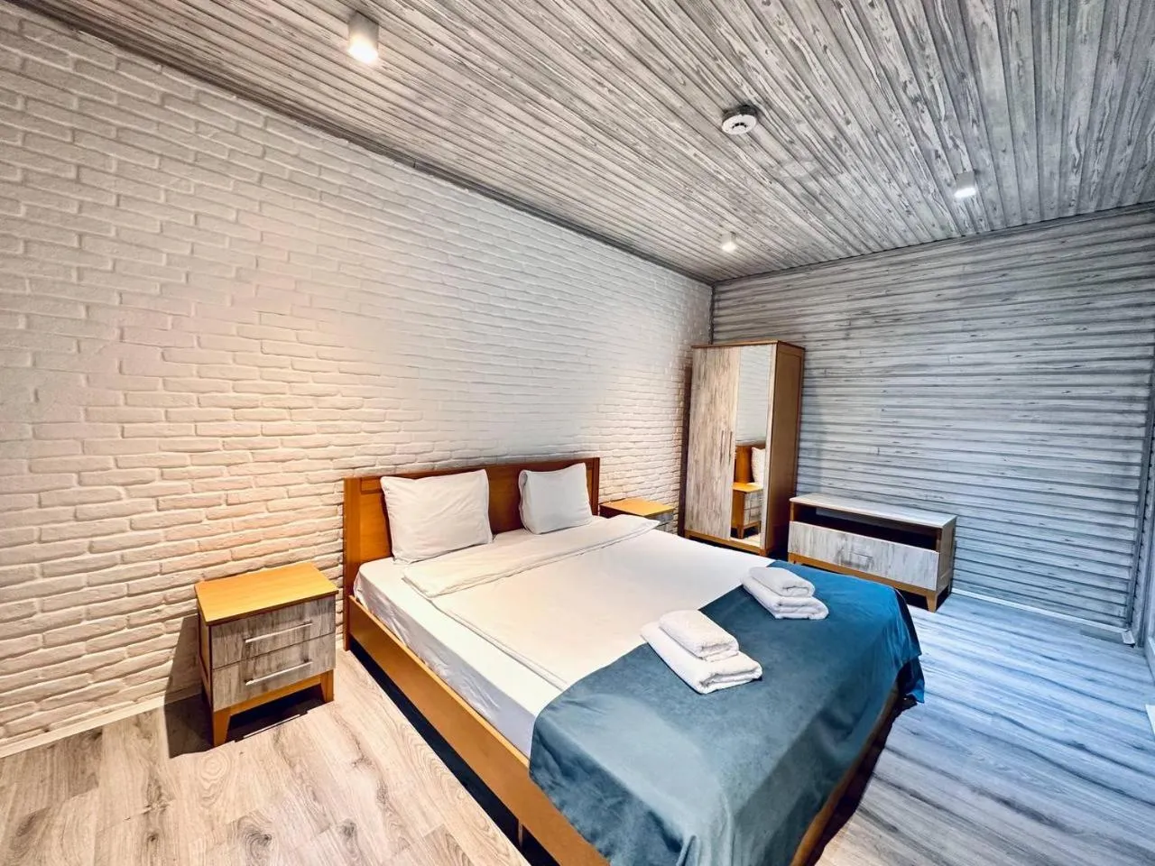 Bed in Deluxe Park Qusar Resort & Spa Hotel